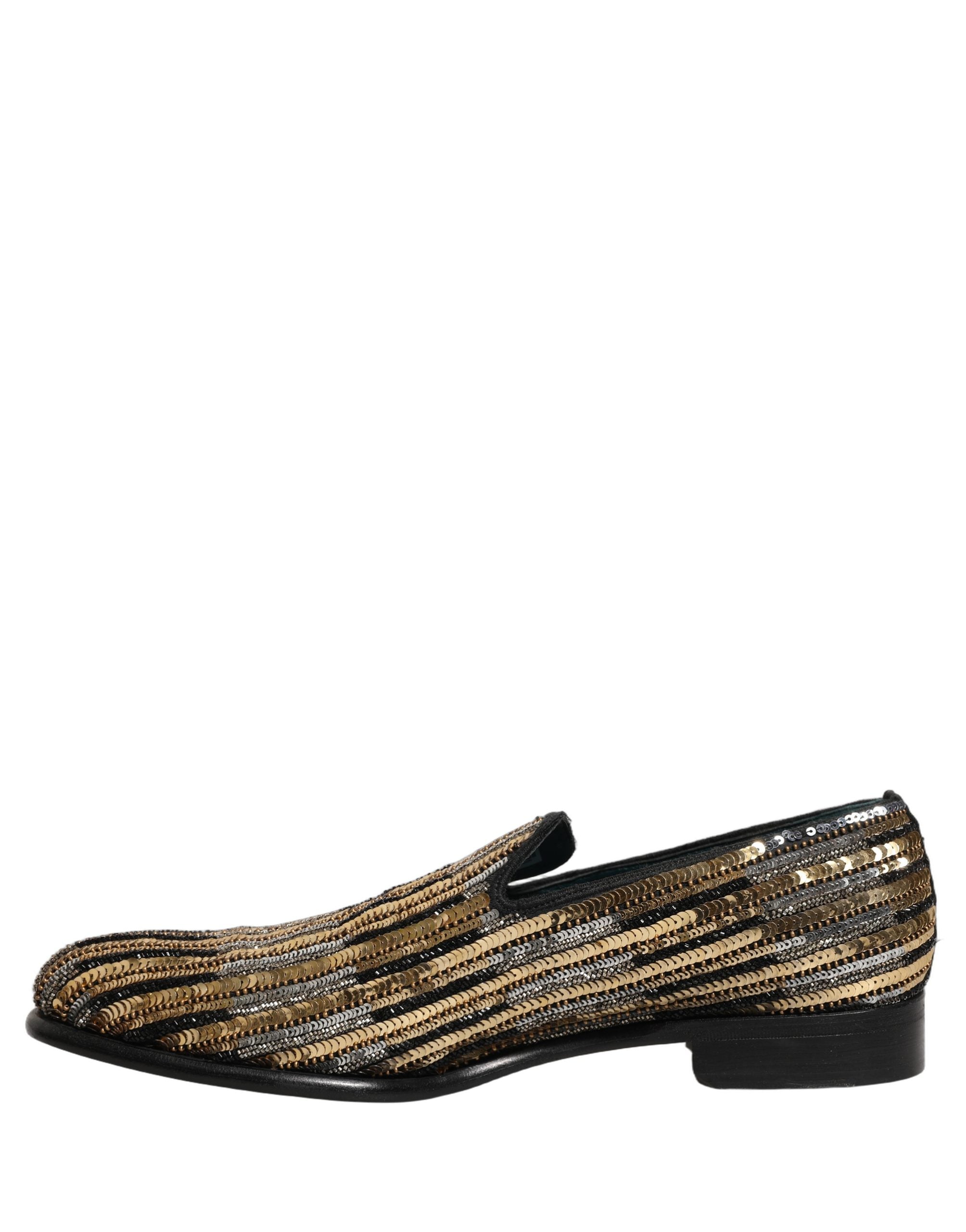 Chaussures mocassins Dolce & Gabbana dorées à rayures avec sequins et embellissements, élégantes et sophistiquées.