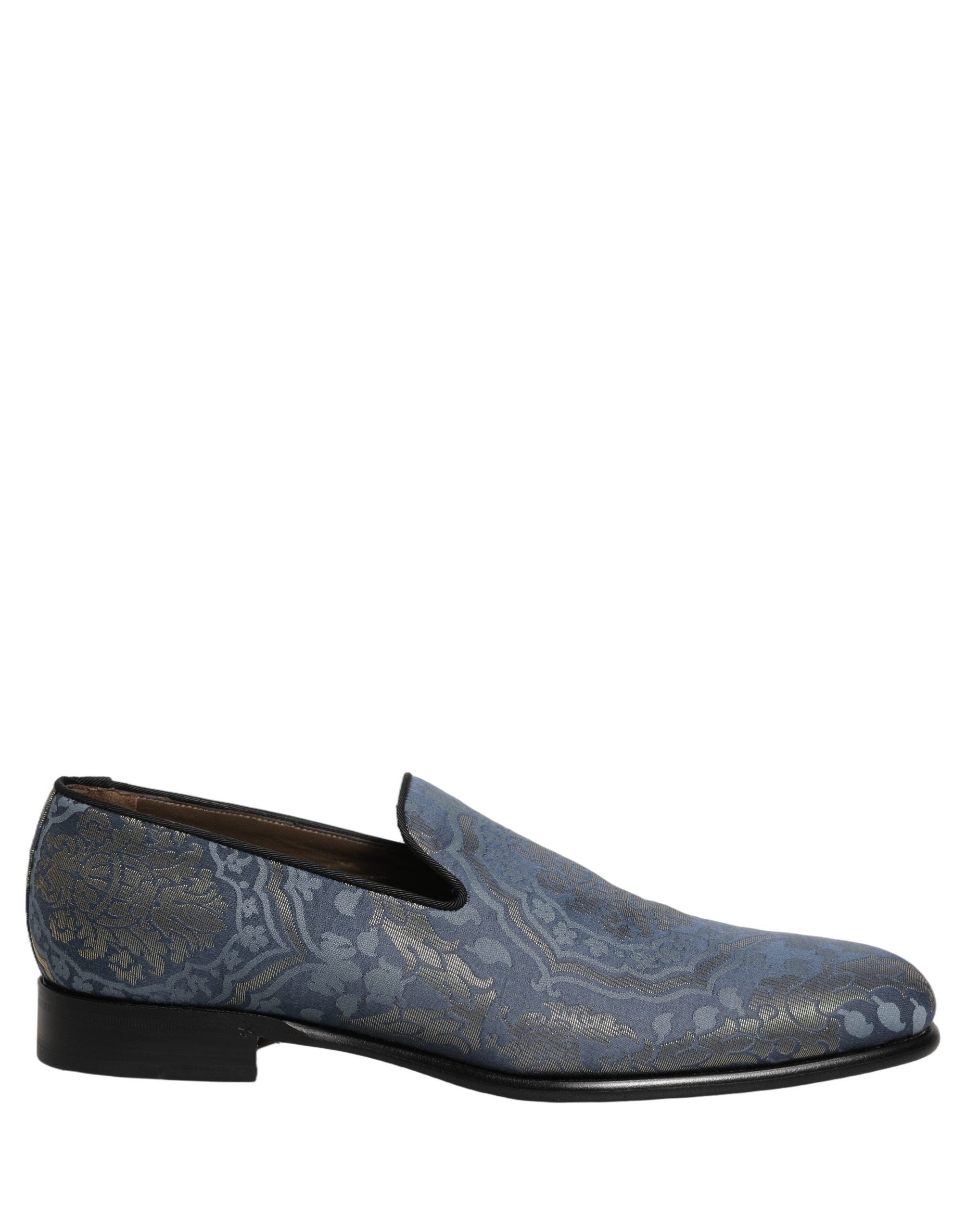 Mocassins Dolce & Gabbana en brocart floral bleu, slip-on élégants avec détails sophistiqués et semelle en cuir.