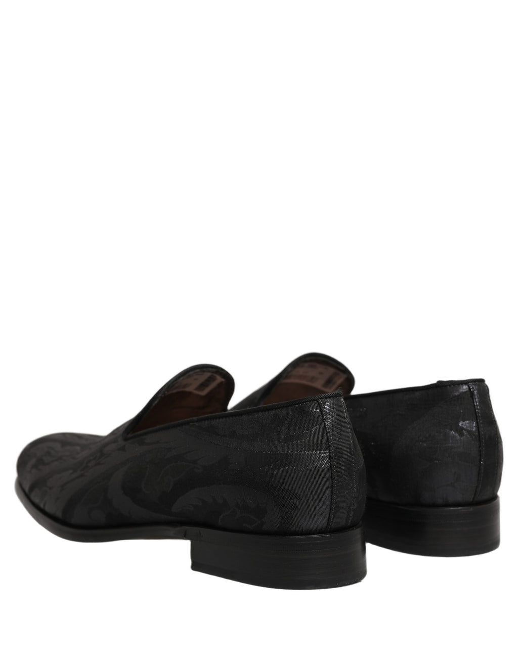 Chaussures mocassins homme Dolce & Gabbana en brocart noir, élégantes et sans lacets, pour un style sophistiqué.