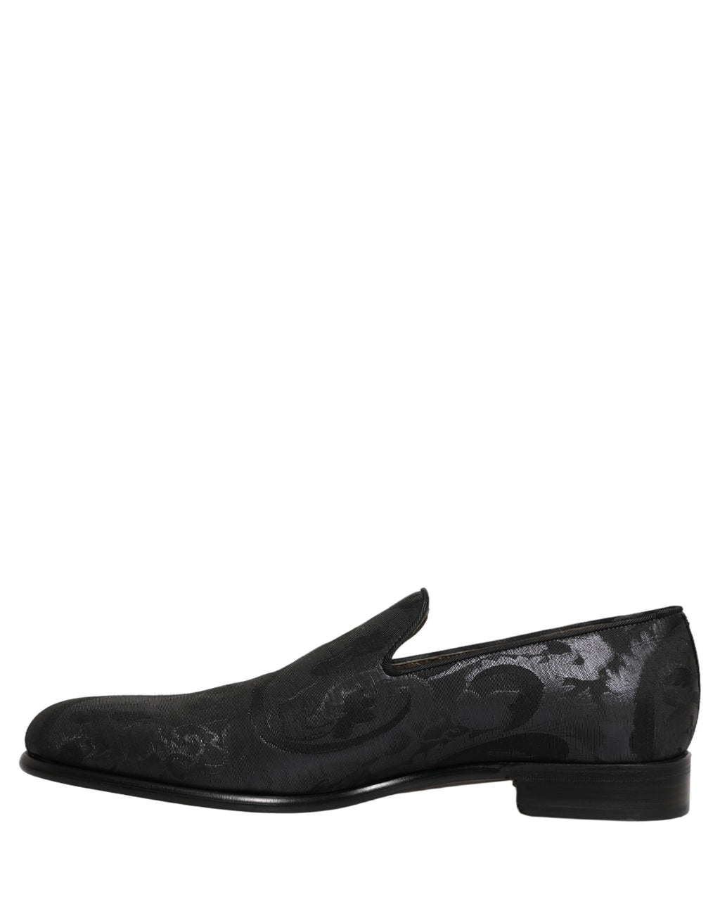 Chaussures mocassins homme Dolce & Gabbana en brocart noir, slip-on élégants et sophistiqués avec détails texturés.