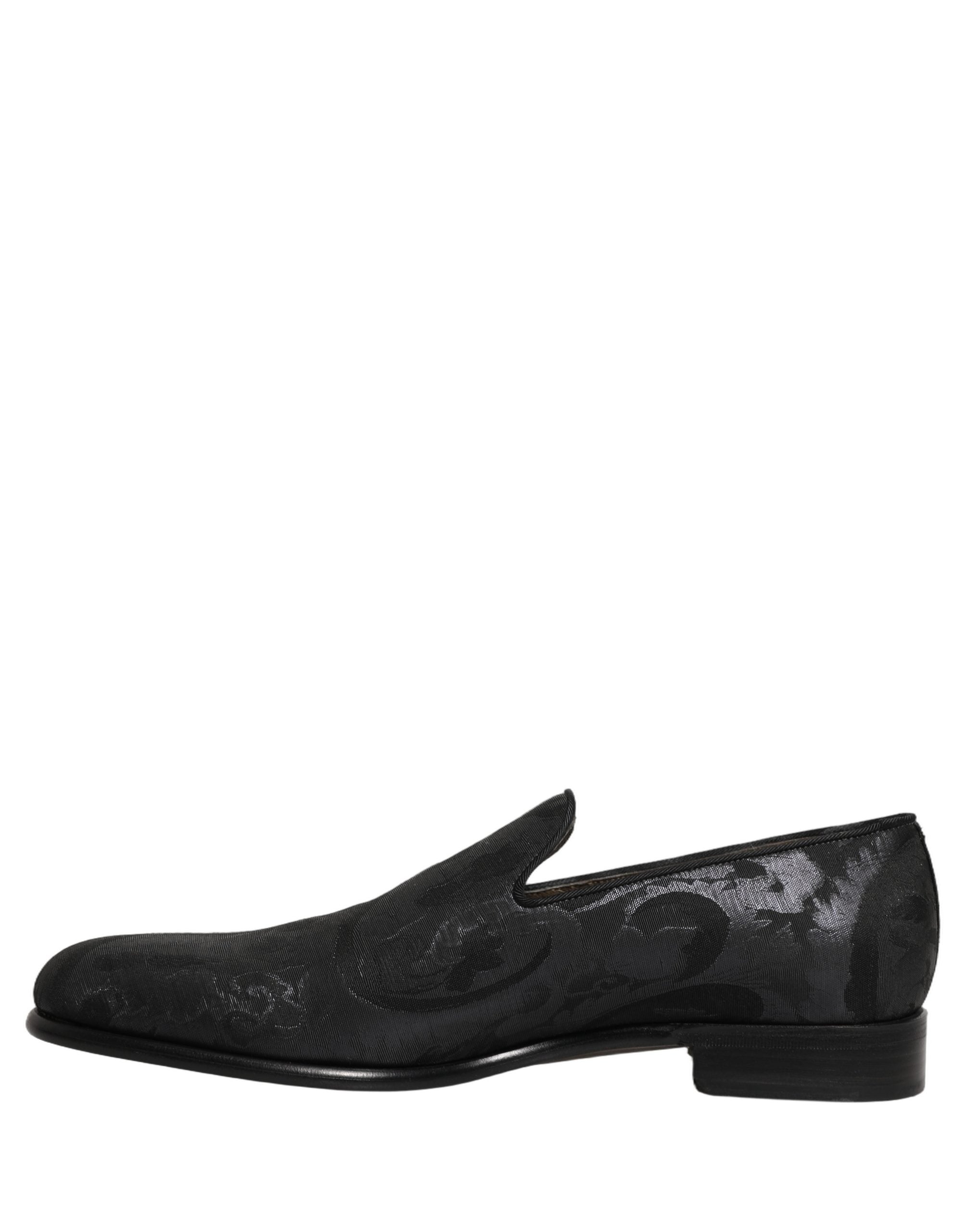Chaussures mocassins homme Dolce & Gabbana en brocart noir, slip-on élégants et sophistiqués avec détails texturés.