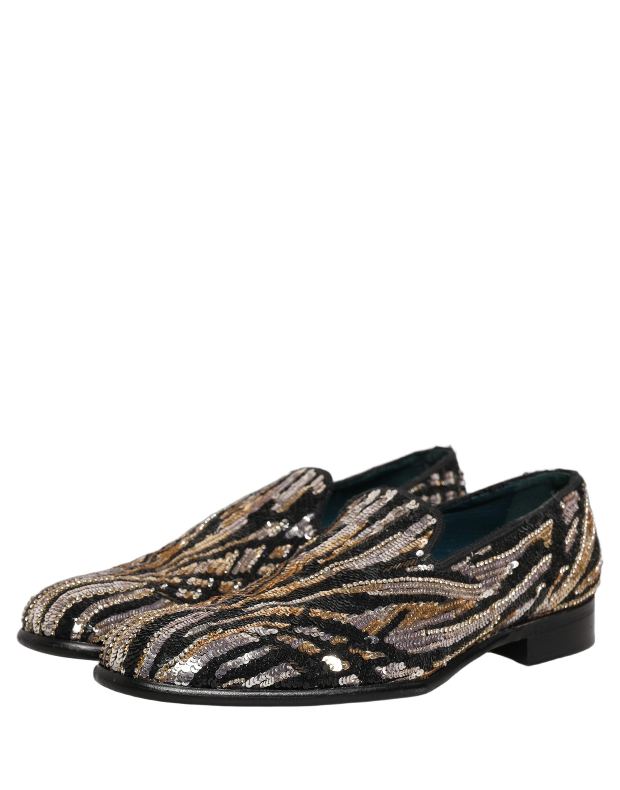 Chaussures mocassins Dolce & Gabbana dorées à rayures, ornées de sequins brillants et embellissements élégants.