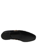 Chaussures loafers Dolce & Gabbana en velours noir avec embellissements élégants, alliance de style et sophistication.