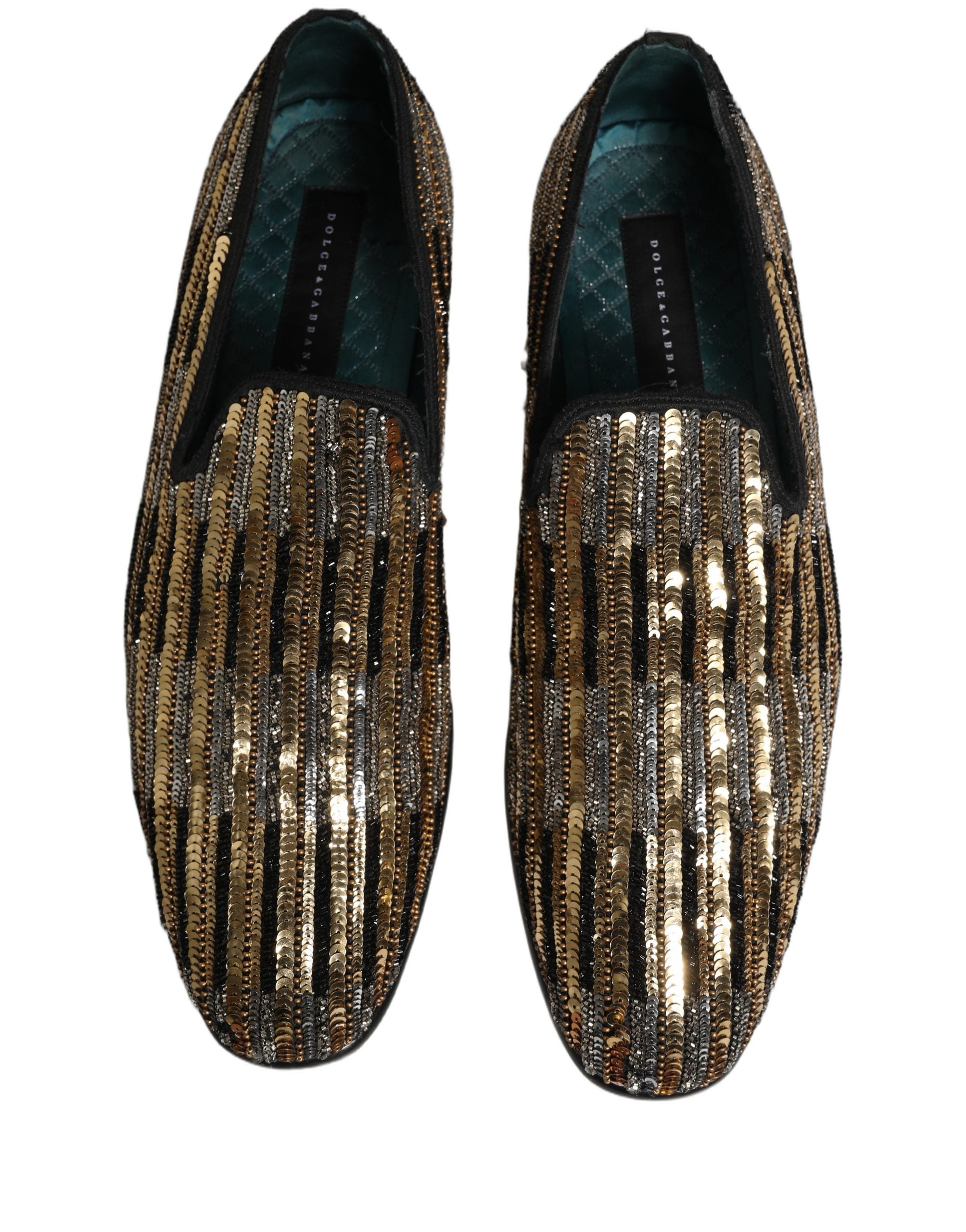Chaussures mocassins Dolce & Gabbana dorées à rayures, ornées de sequins brillants et embellissements élégants.