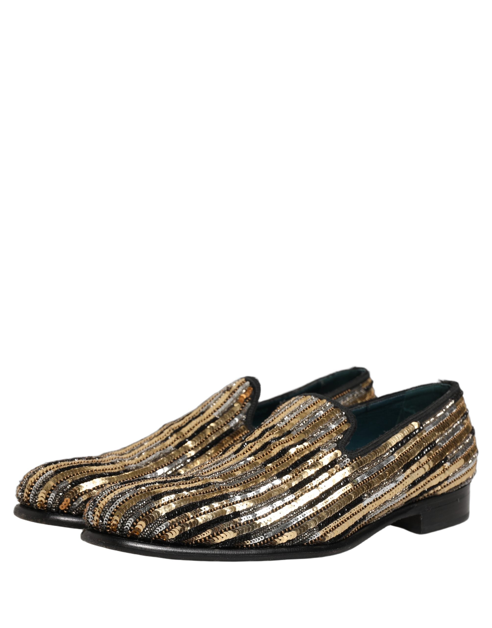Chaussures mocassins Dolce & Gabbana dorées à rayures, ornées de sequins brillants et embellissements luxueux.