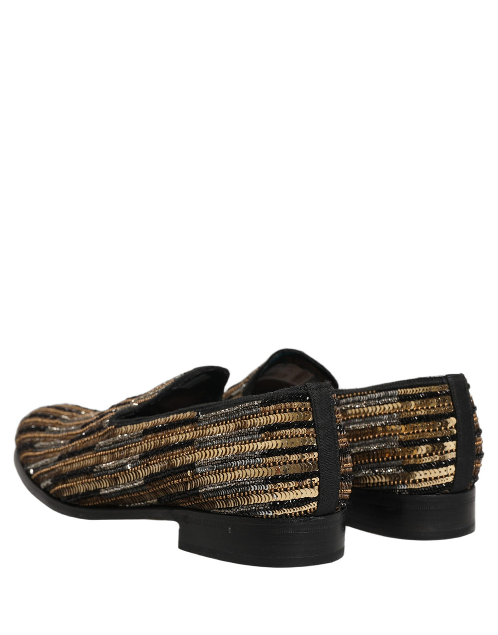 Chaussures loafers Dolce & Gabbana en sequins dorés à rayures, embellies de détails brillants et élégants.