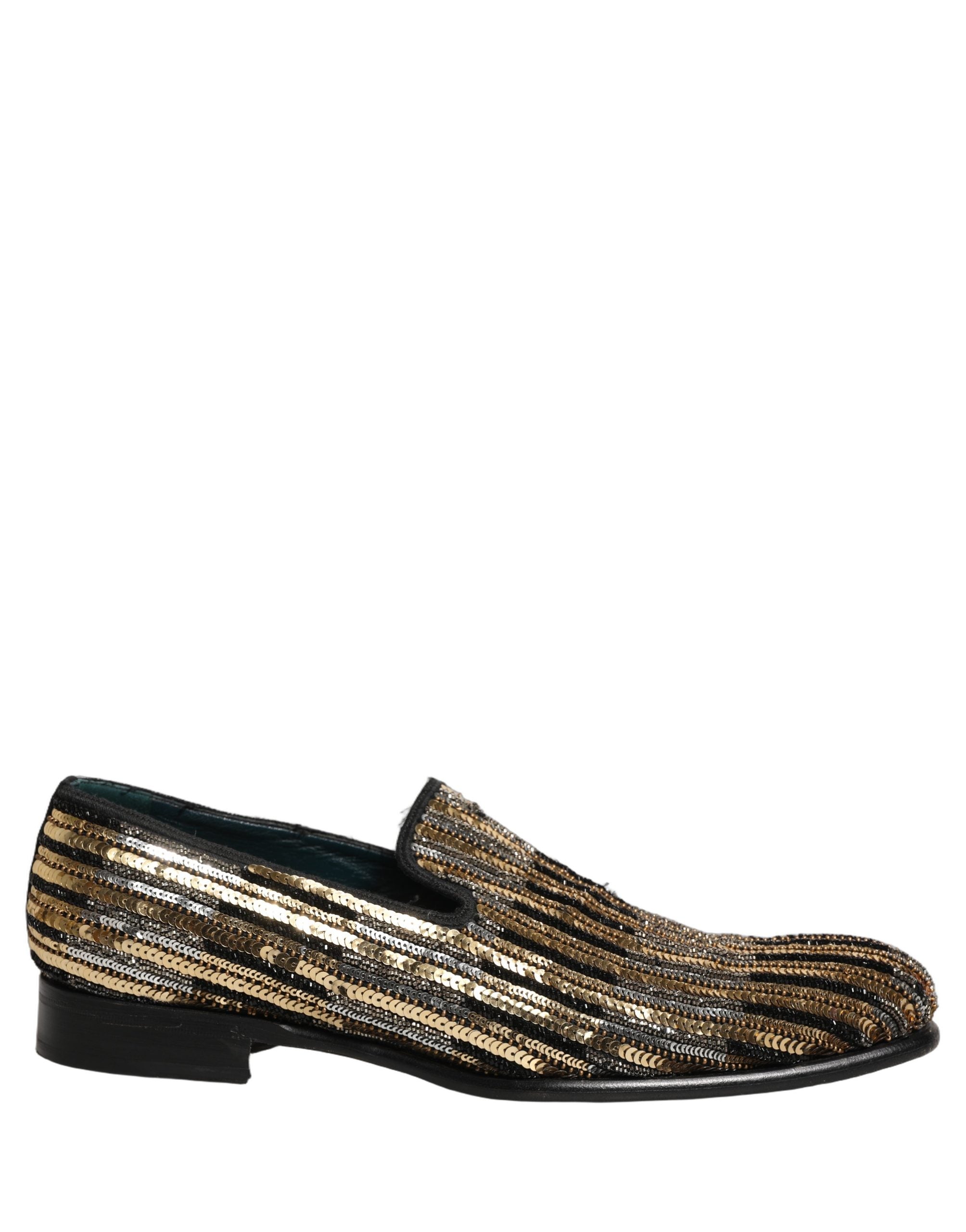 Chaussures loafers Dolce & Gabbana en sequins dorés à rayures, embellies, style élégant et luxe.