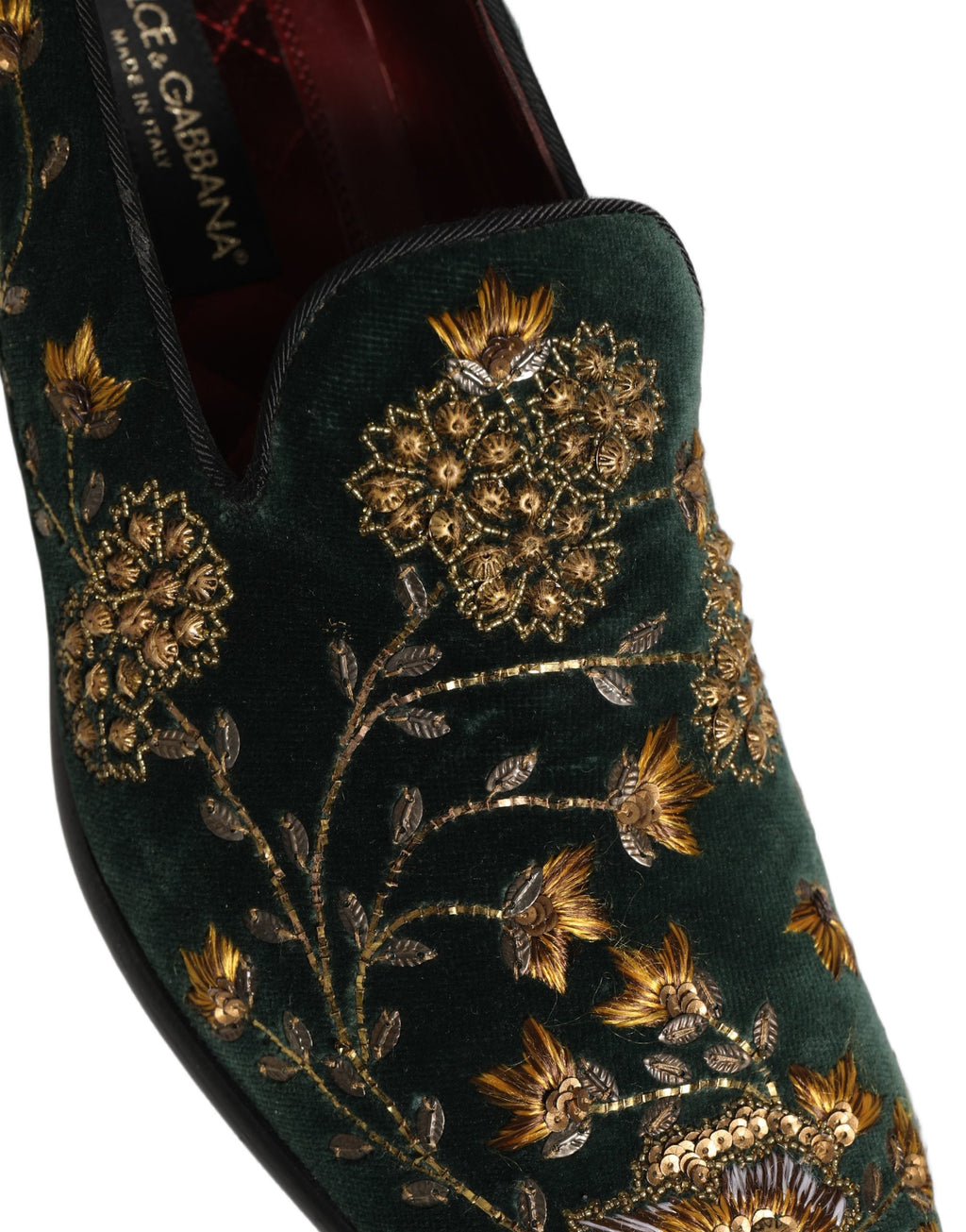 Chaussures loafers Dolce & Gabbana vertes avec broderie florale élégante et détails sophistiqués.