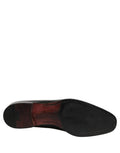 Chaussures mocassins pour homme en cuir verni noir de la marque Dolce & Gabbana, élégantes et sophistiquées.