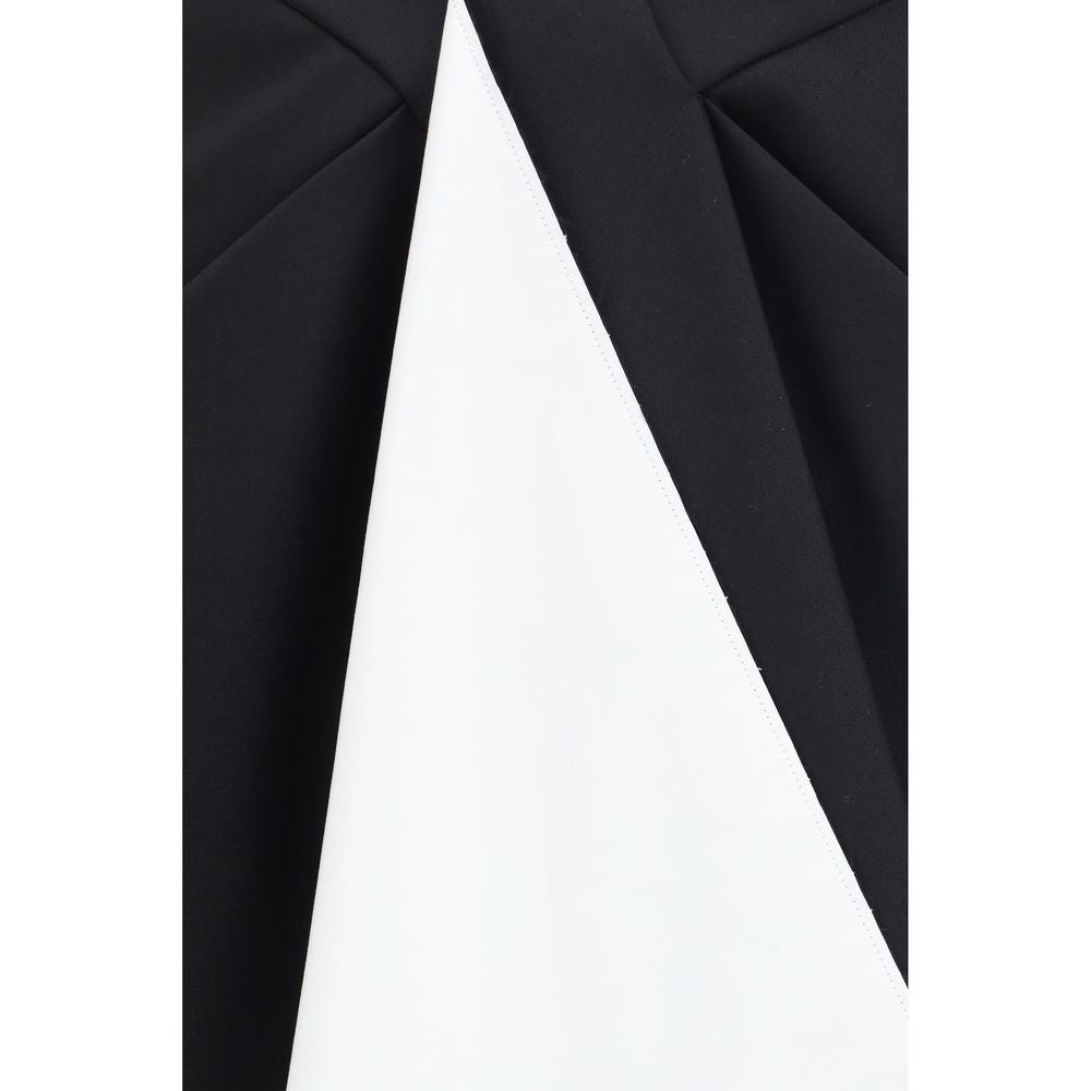 Jupe midi en laine noire Givenchy Oves Aries, coupe élégante et détails sophistiqués visibles sur l'image.