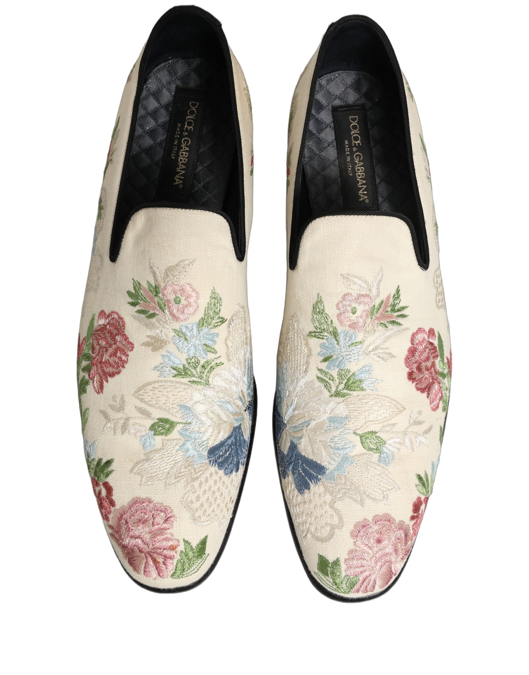 Chaussures mocassins Dolce & Gabbana blanches avec broderie florale, élégantes et sophistiquées.