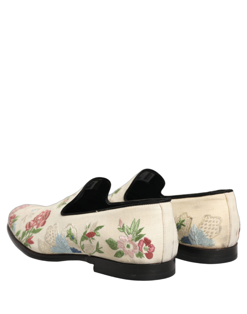 Chaussures loafers Dolce & Gabbana blanches avec broderie florale élégante, finition raffinée et design sophistiqué.