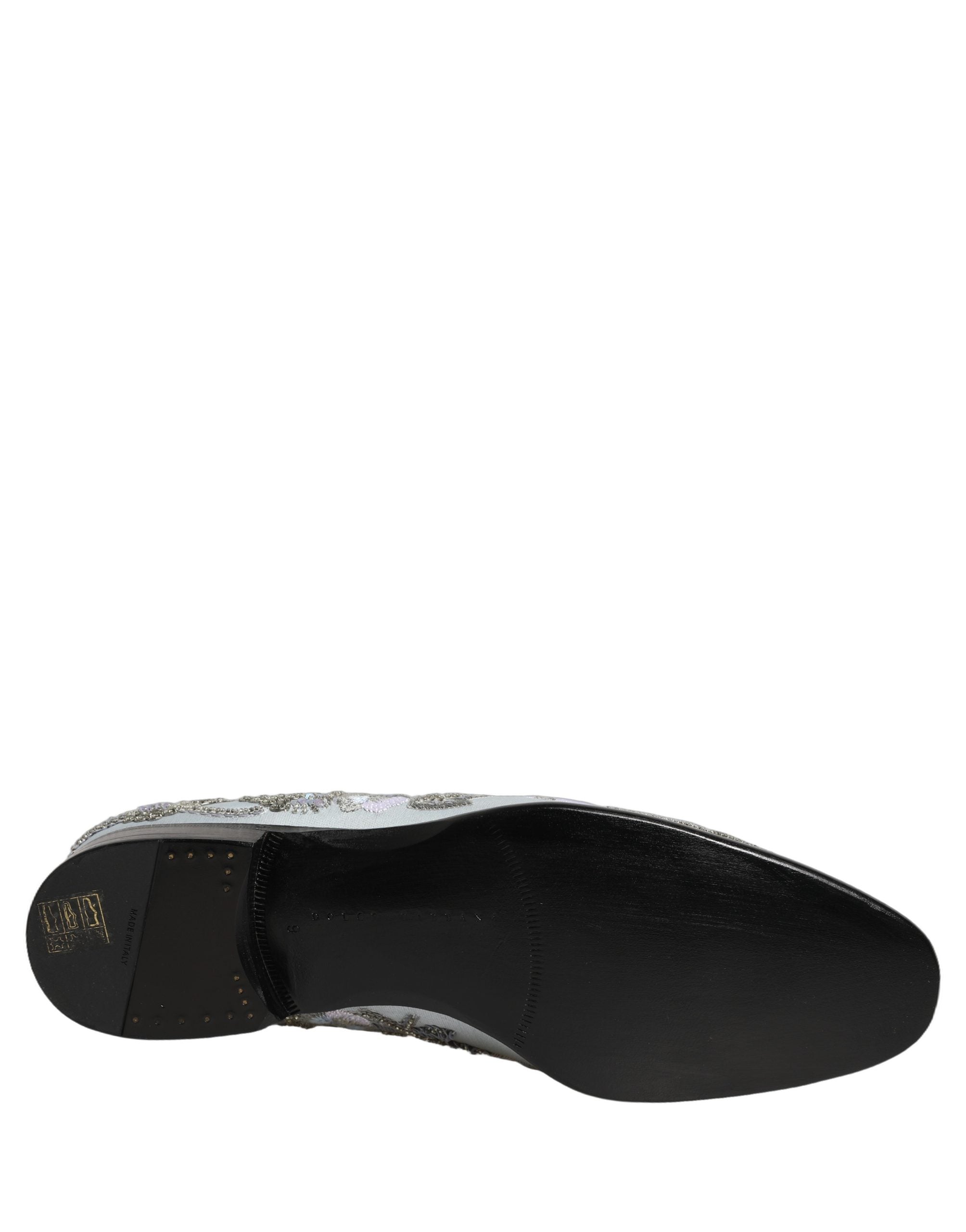 Chaussures mocassins pour homme Dolce & Gabbana blanches avec broderies florales et embellissements élégants.