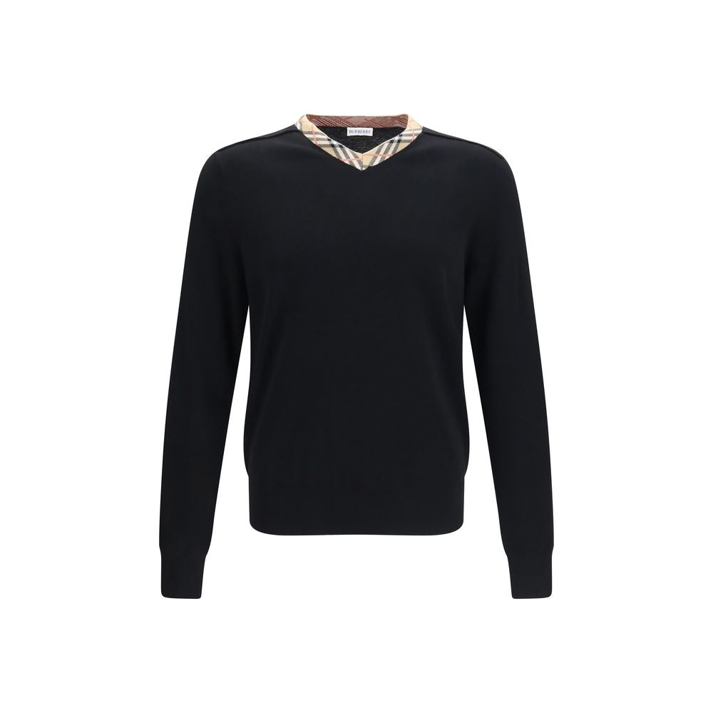 Sweatshirt en laine noire Burberry Oves Aries, style décontracté avec logo distinctif, porté sur un mannequin.