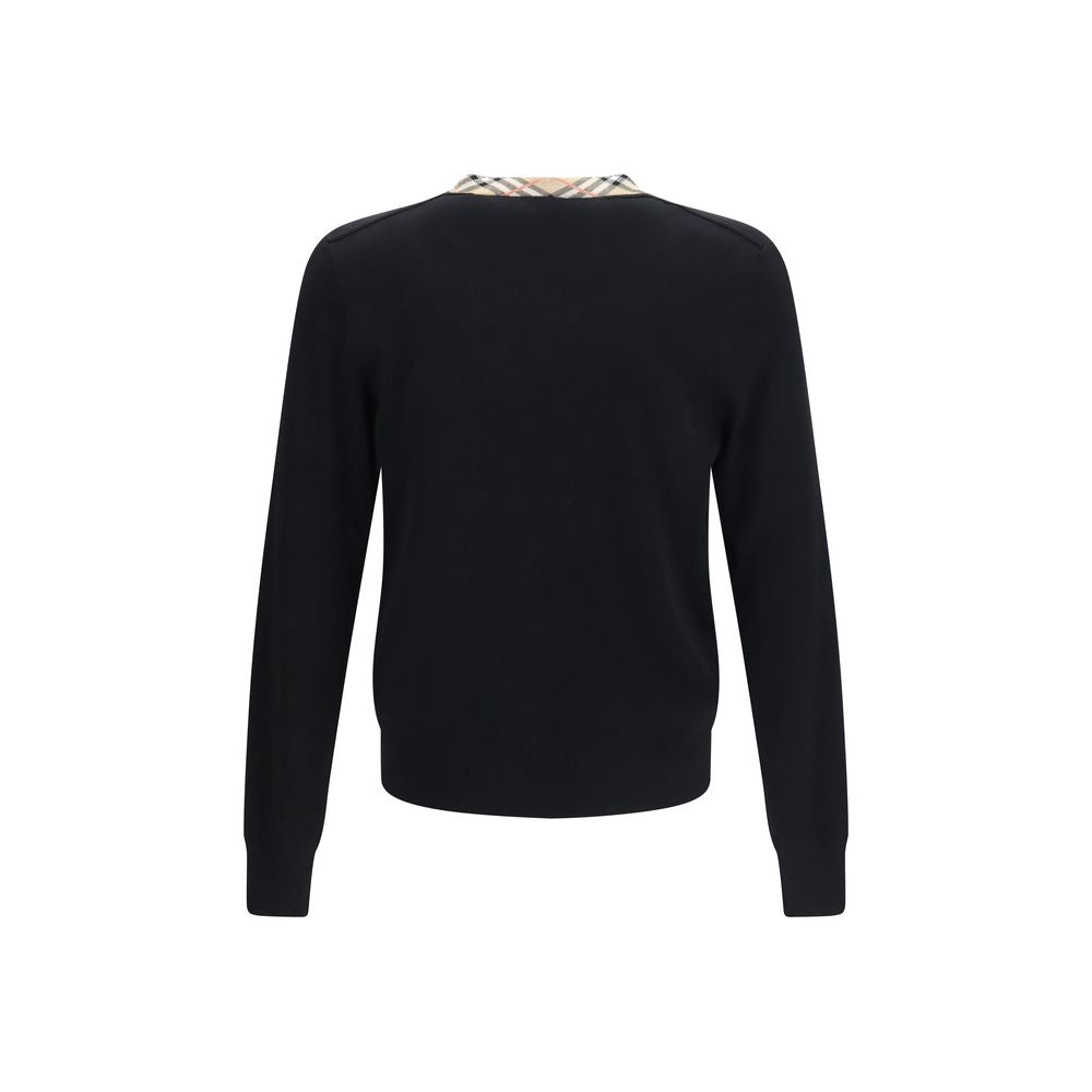 Sweat-shirt en laine noire Burberry Aries Oves avec logo brodé, porté sur un modèle avec un fond neutre.
