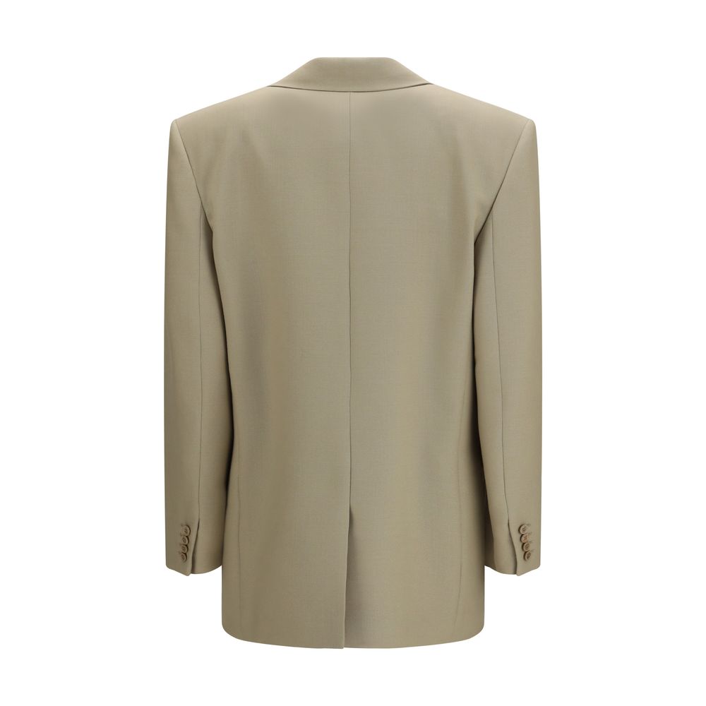 Veste blazer beige en laine Saint Laurent Oves Aries, coupe élégante et détails sophistiqués, portée sur un mannequin.