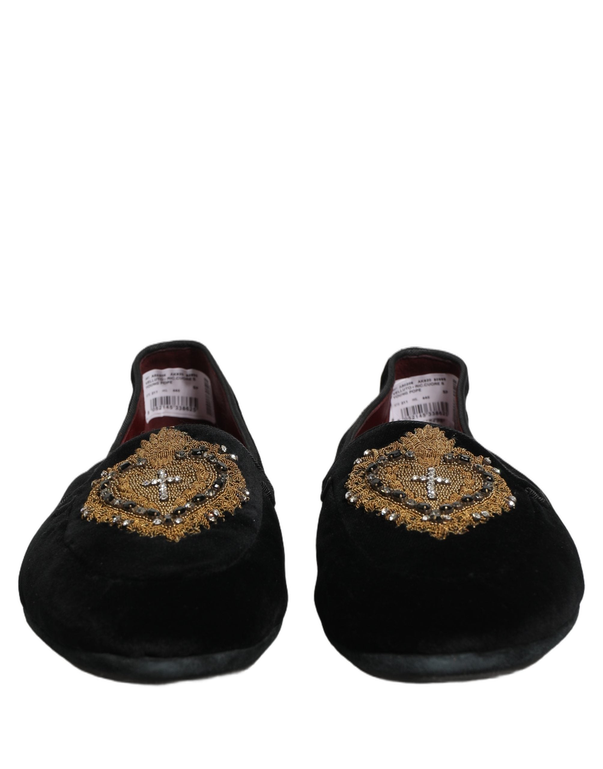 Chaussures loafers Dolce & Gabbana en velours noir avec motif de cœur sacré, élégantes et raffinées.