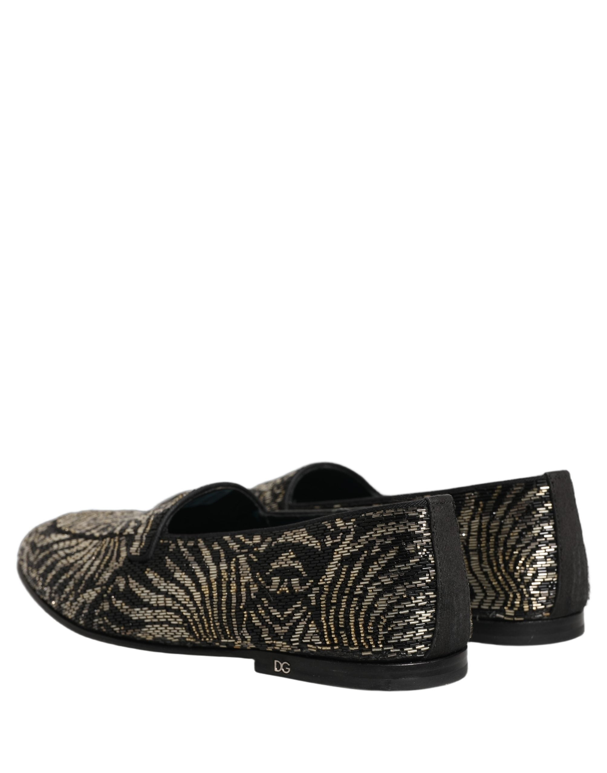 Chaussures mocassins Dolce & Gabbana noir et argentés avec ornements brillants et détails élégants, pour un style sophistiqué.