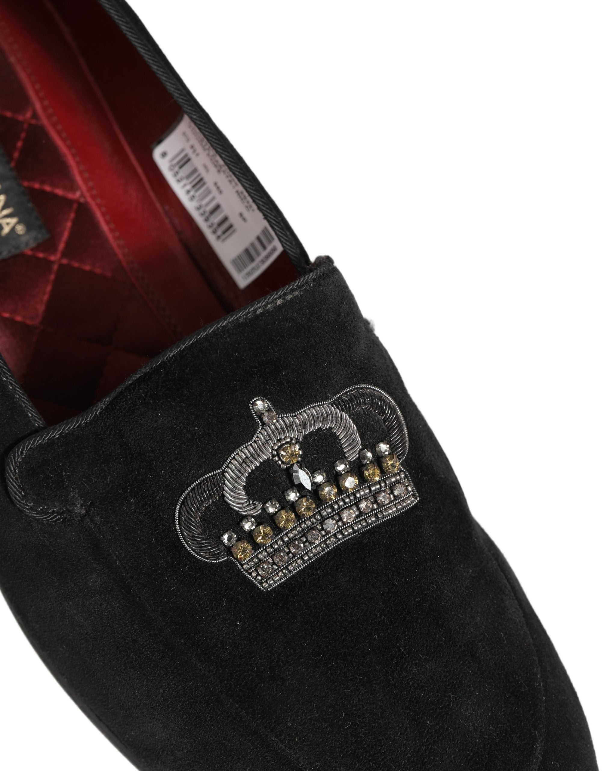 Chaussures loafers Dolce & Gabbana noires avec couronne ornée, élégantes et sophistiquées pour femmes.