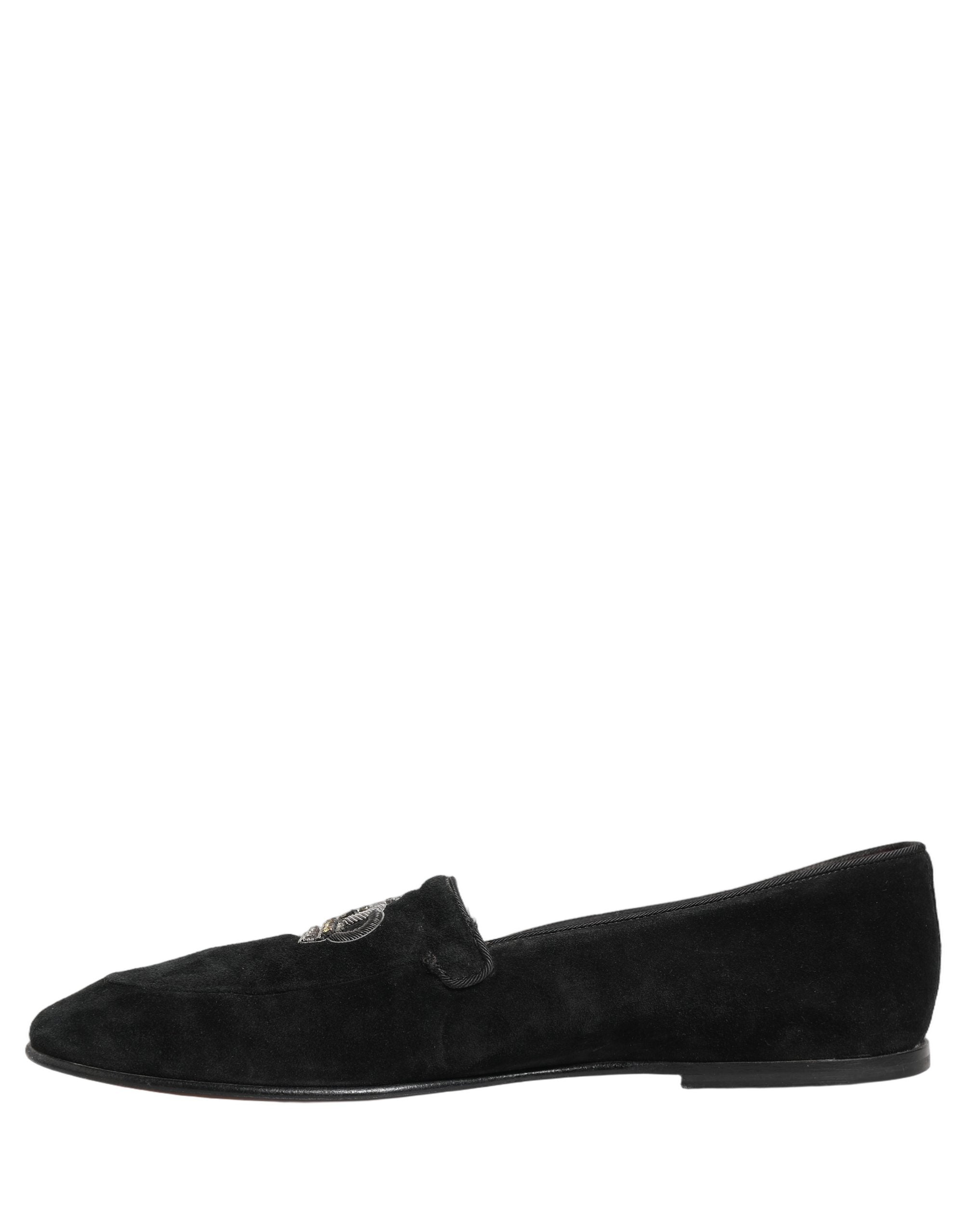 Chaussures loafers Dolce & Gabbana noires avec couronne ornée, élégantes et sophistiquées, en cuir avec détails brodés.