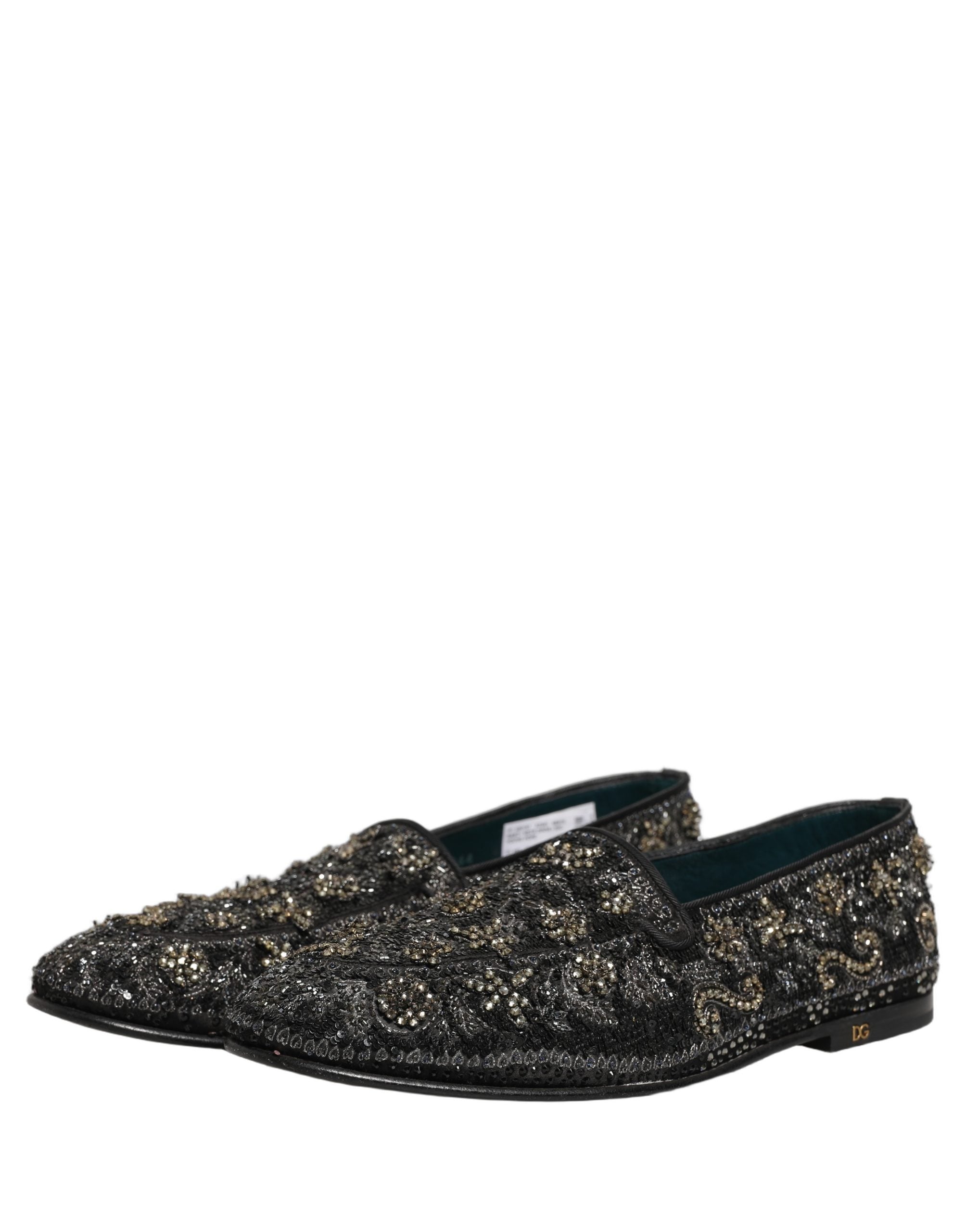 Mocassins noirs Dolce & Gabbana ornés de strass brillants et embellis, chaussures élégantes en cuir avec détails scintillants.