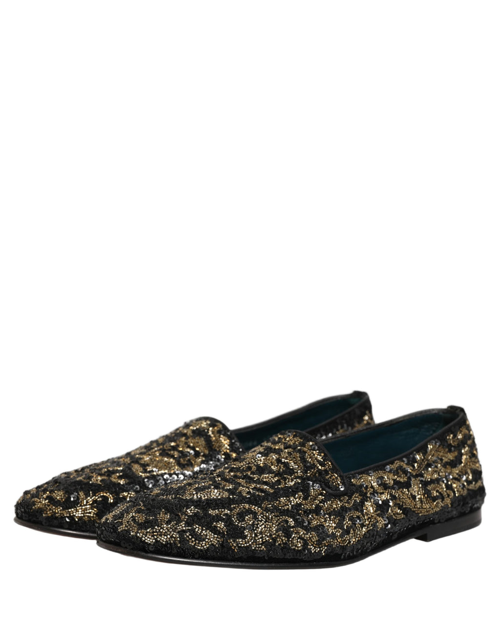 Chaussures loafers Dolce & Gabbana noires et dorées ornées de détails brillants, élégantes et sophistiquées.