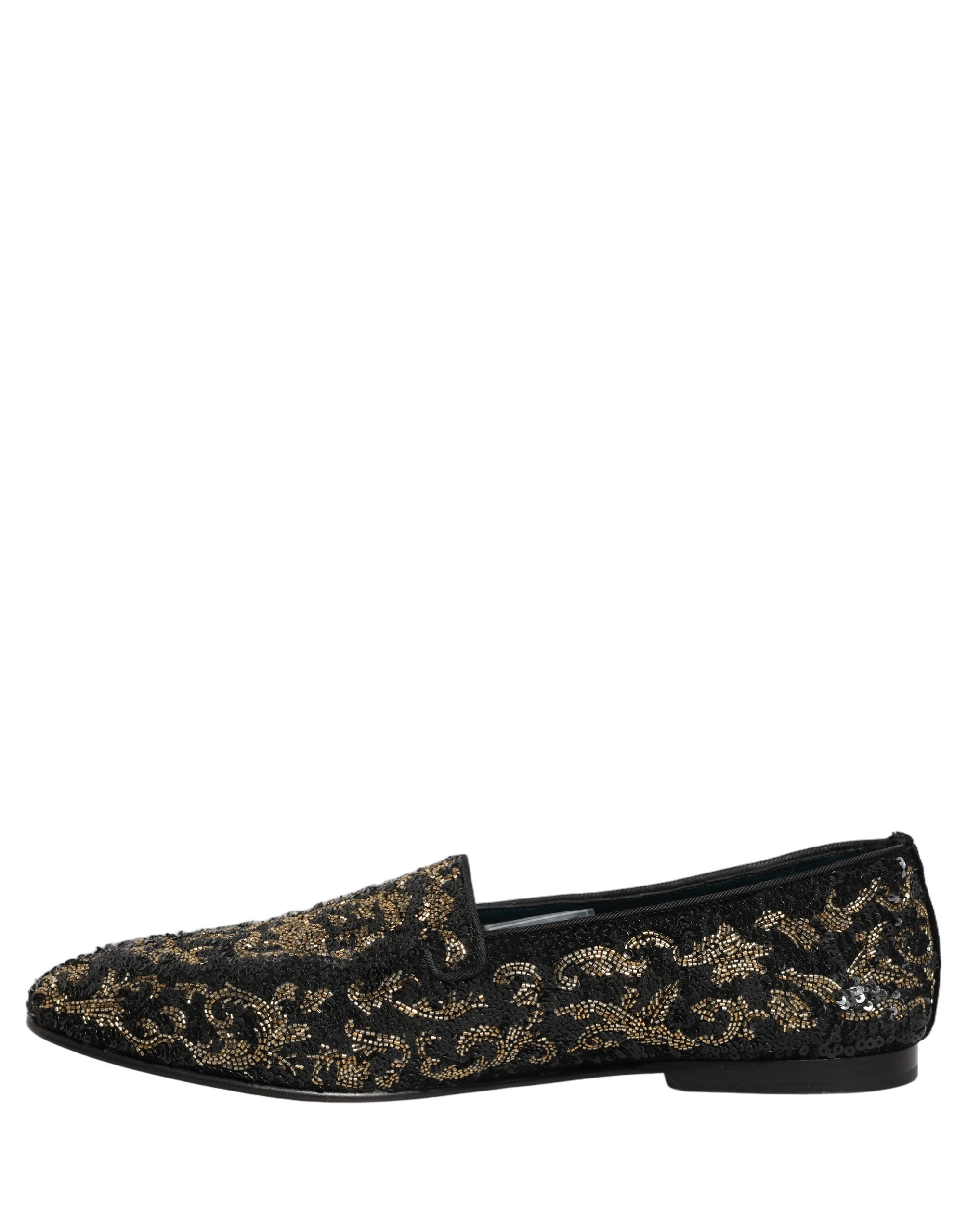 Chaussures loafers Dolce & Gabbana noires et dorées avec embellissements, style élégant et sophistiqué.