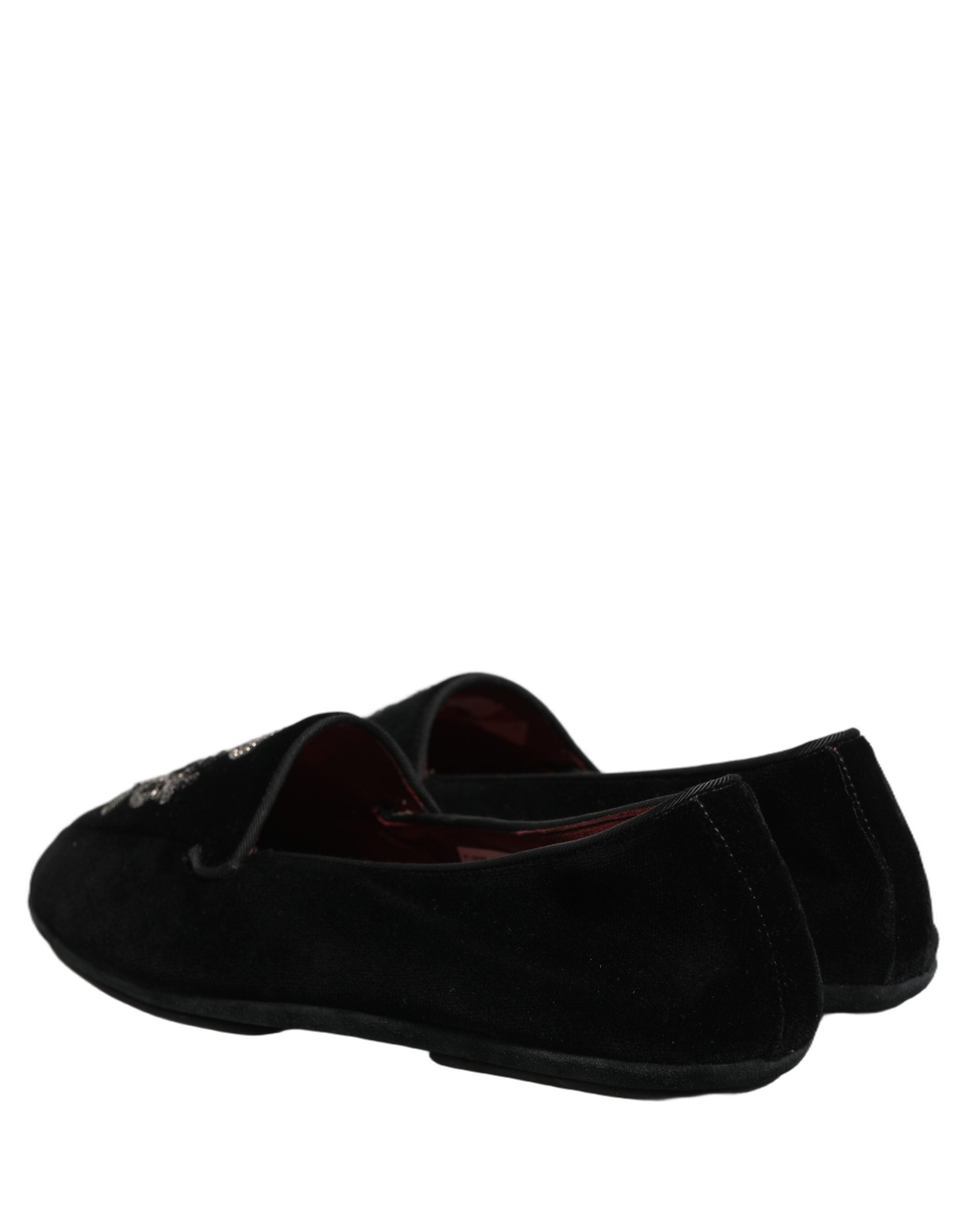 Chaussures mocassins Dolce & Gabbana en velours noir avec broderie couronne, élégantes et luxueuses, vues de face.