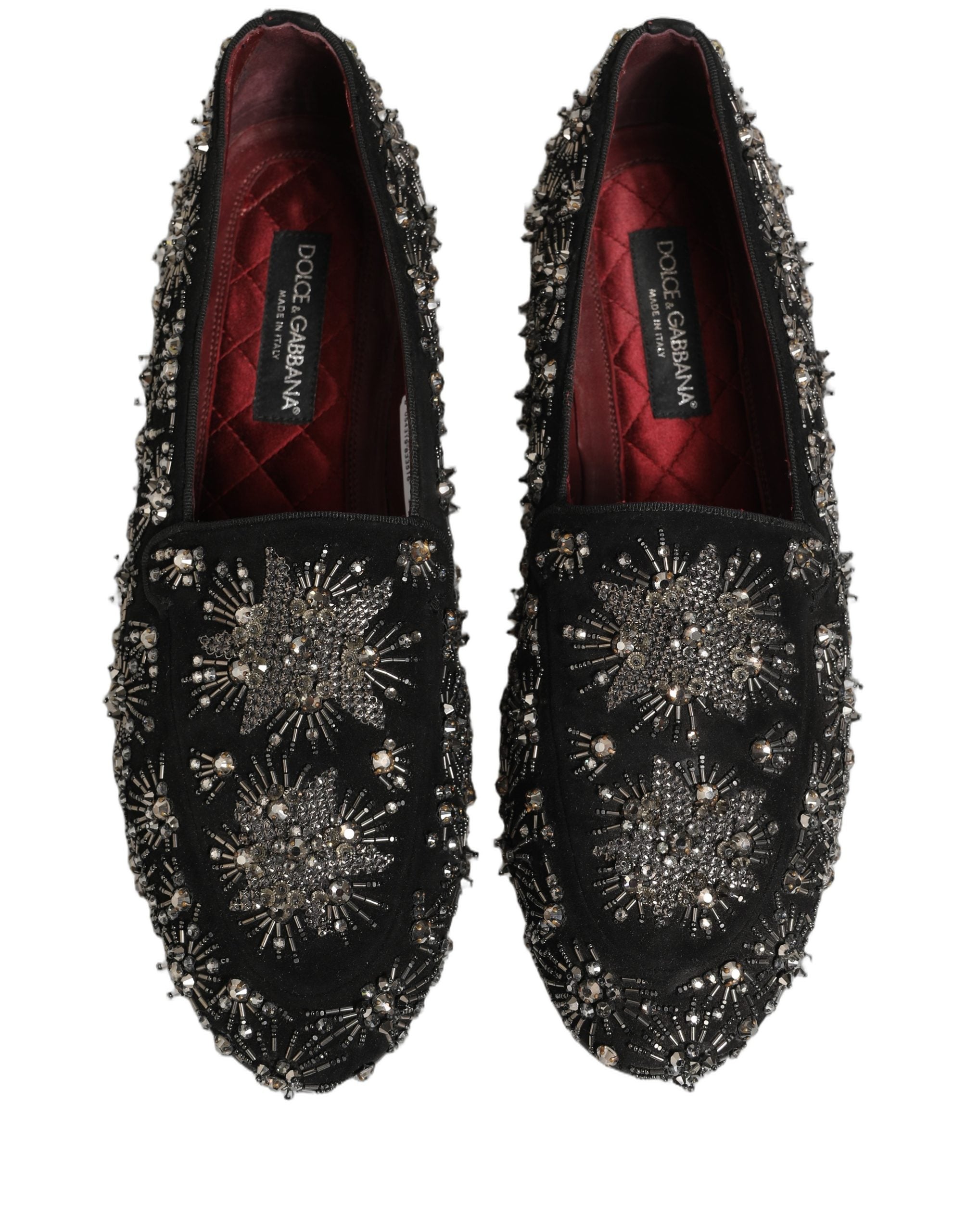 Chaussures loafers Dolce & Gabbana noires à cristaux ornés, élégantes et sophistiquées, vues de face avec détails brillants.