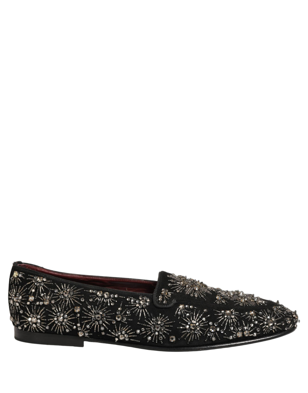 Chaussures loafers Dolce & Gabbana noires avec cristaux ornementaux, élégantes et sophistiquées, vues de côté.