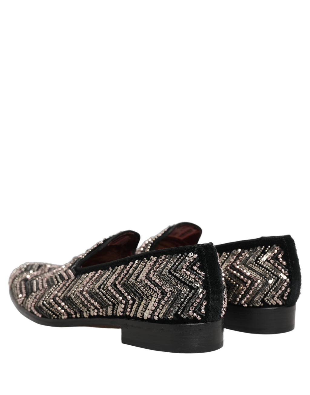 Chaussures loafers en velours noir Dolce & Gabbana avec embellissements floraux élégants.