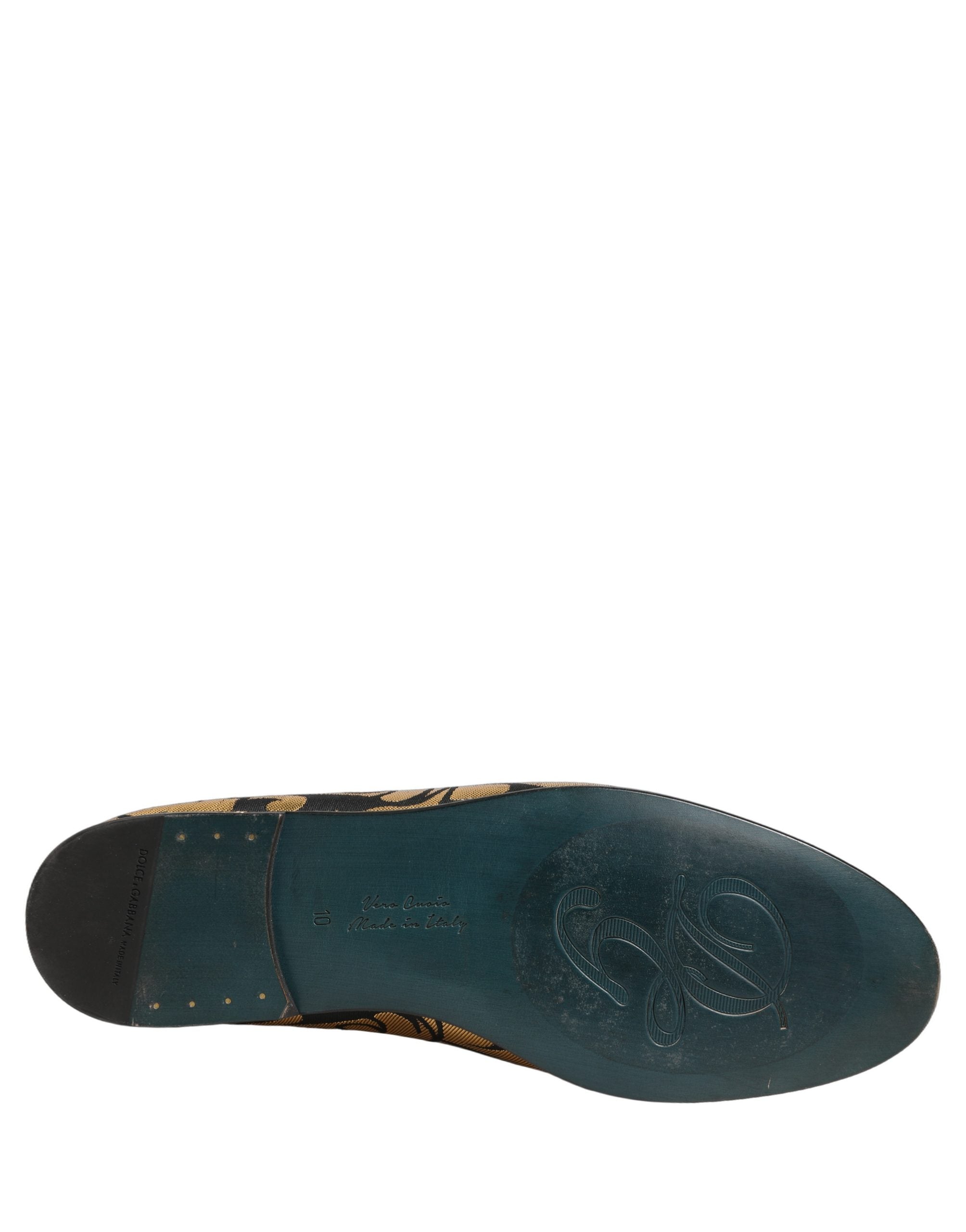 Chaussures loafers Dolce & Gabbana noires et dorées avec motif floral jacquard, élégantes et sophistiquées.