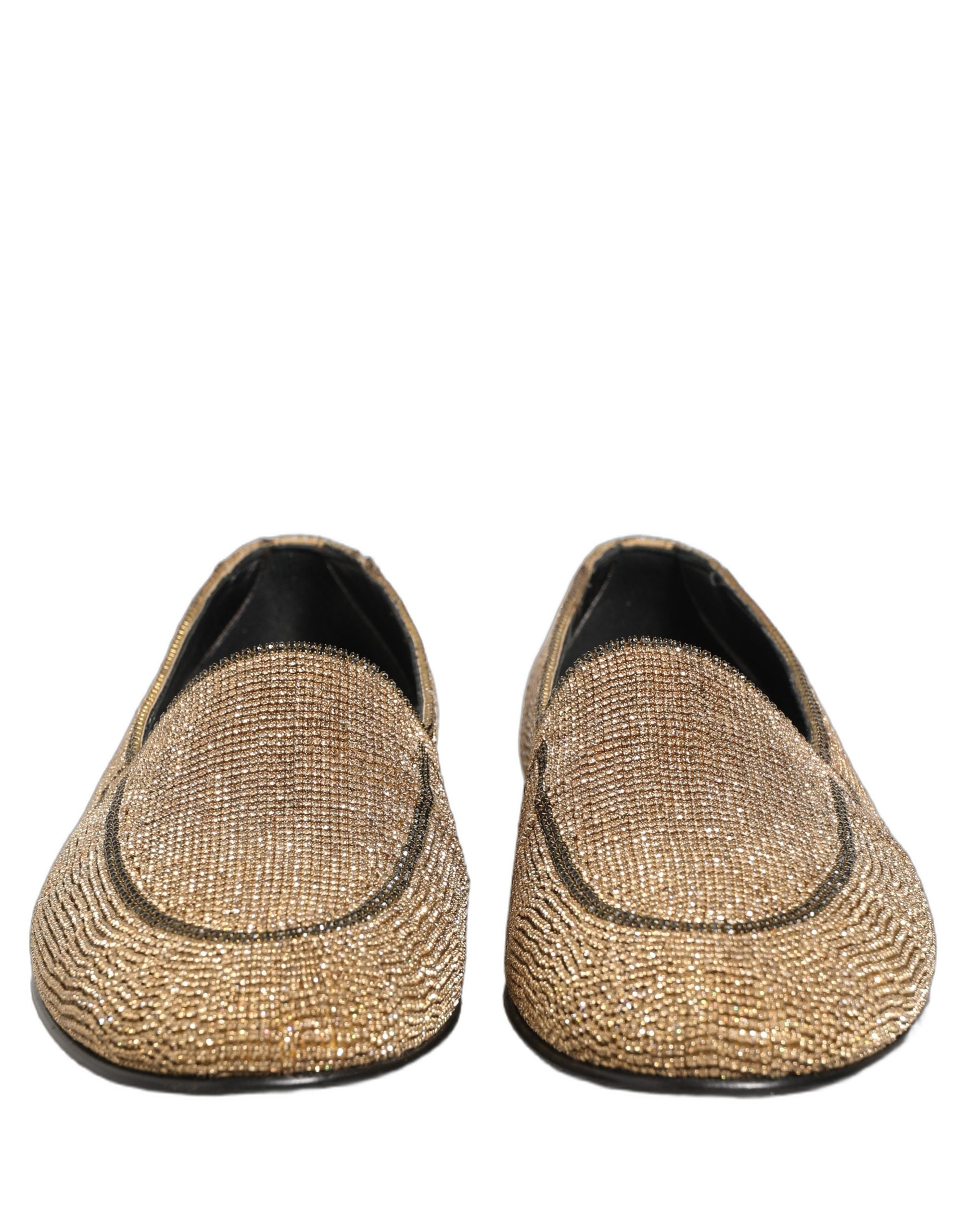 Chaussures loafers pour homme Dolce & Gabbana en or avec cristaux brillants, élégantes et sophistiquées, vues de côté.