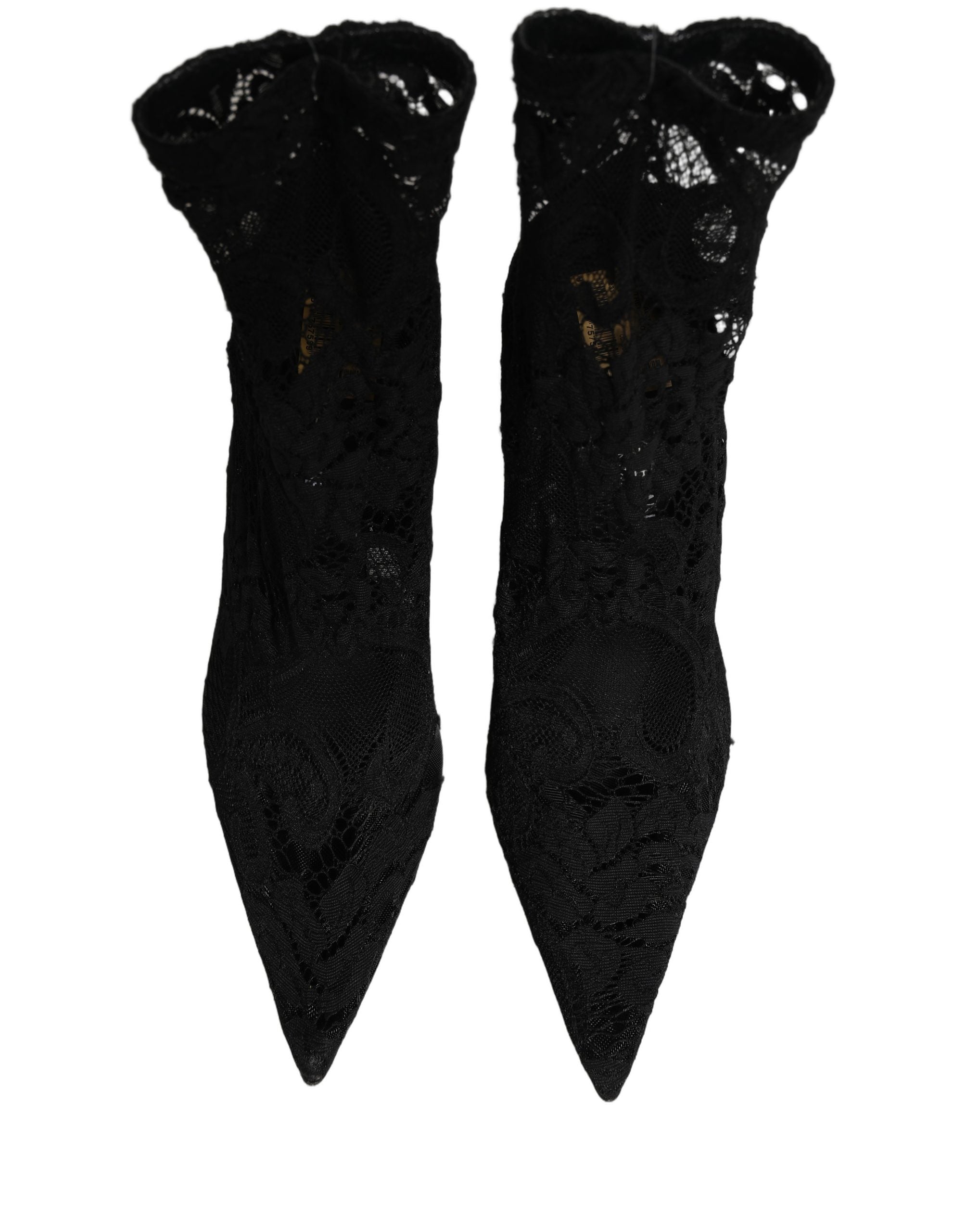 Chaussettes noires Dolce & Gabbana avec détails en dentelle, portées avec des chaussures ou bottes élégantes.