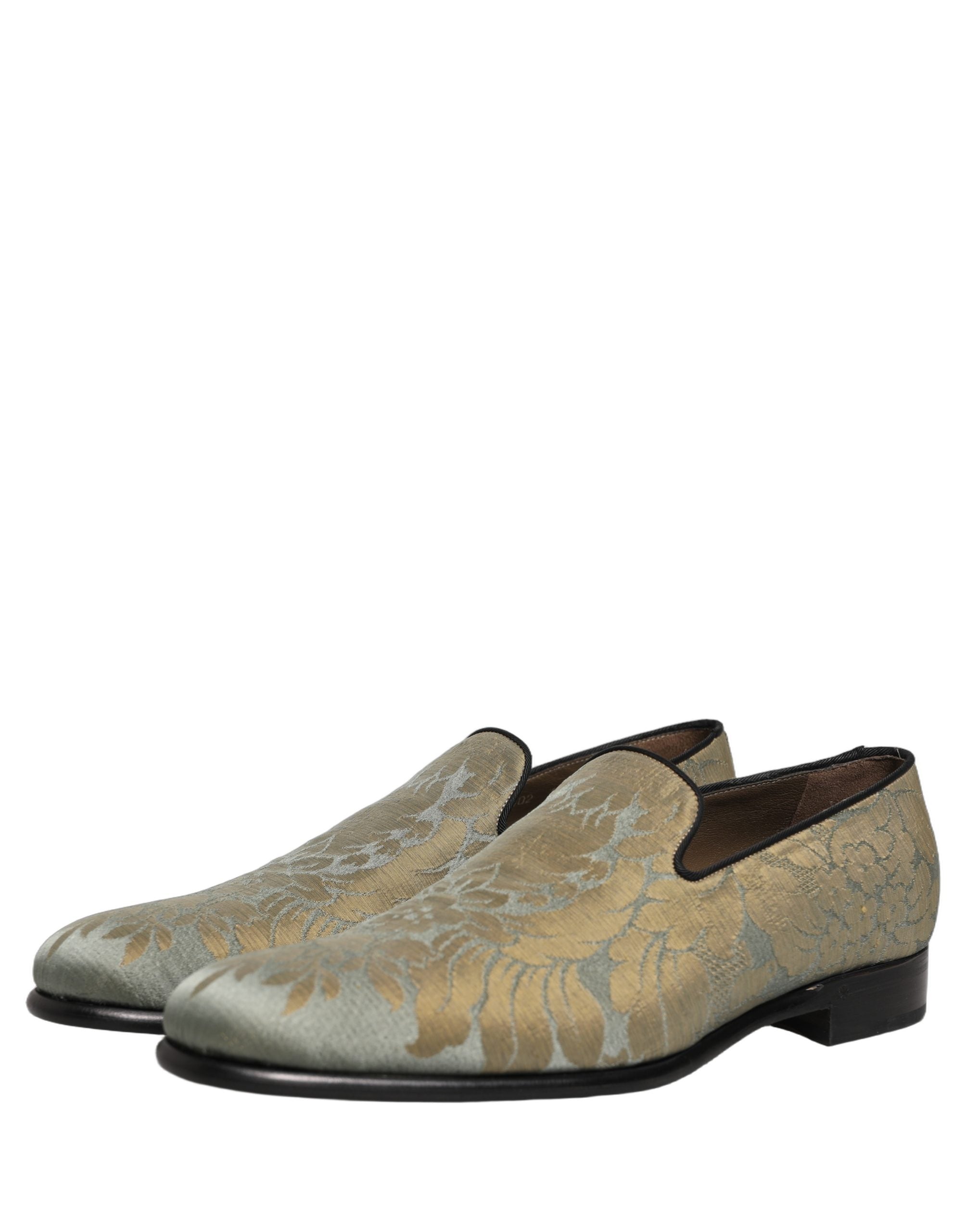 Chaussures mocassins Dolce & Gabbana en jacquard floral doré, style slip-on élégant et confortable pour femmes.