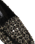 Chaussures loafers Dolce & Gabbana noires avec cristaux brillants et détails élégants, chaussures en cuir sophistiquées.