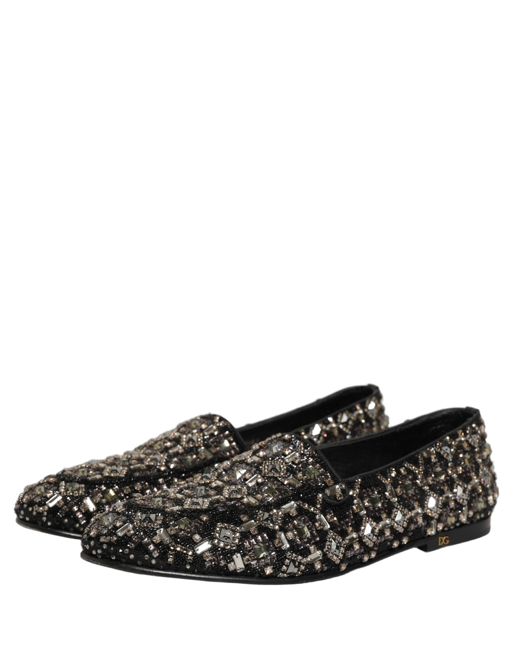 Chaussures loafers Dolce & Gabbana noires ornées de cristaux brillants, style élégant et sophistiqué pour femme.