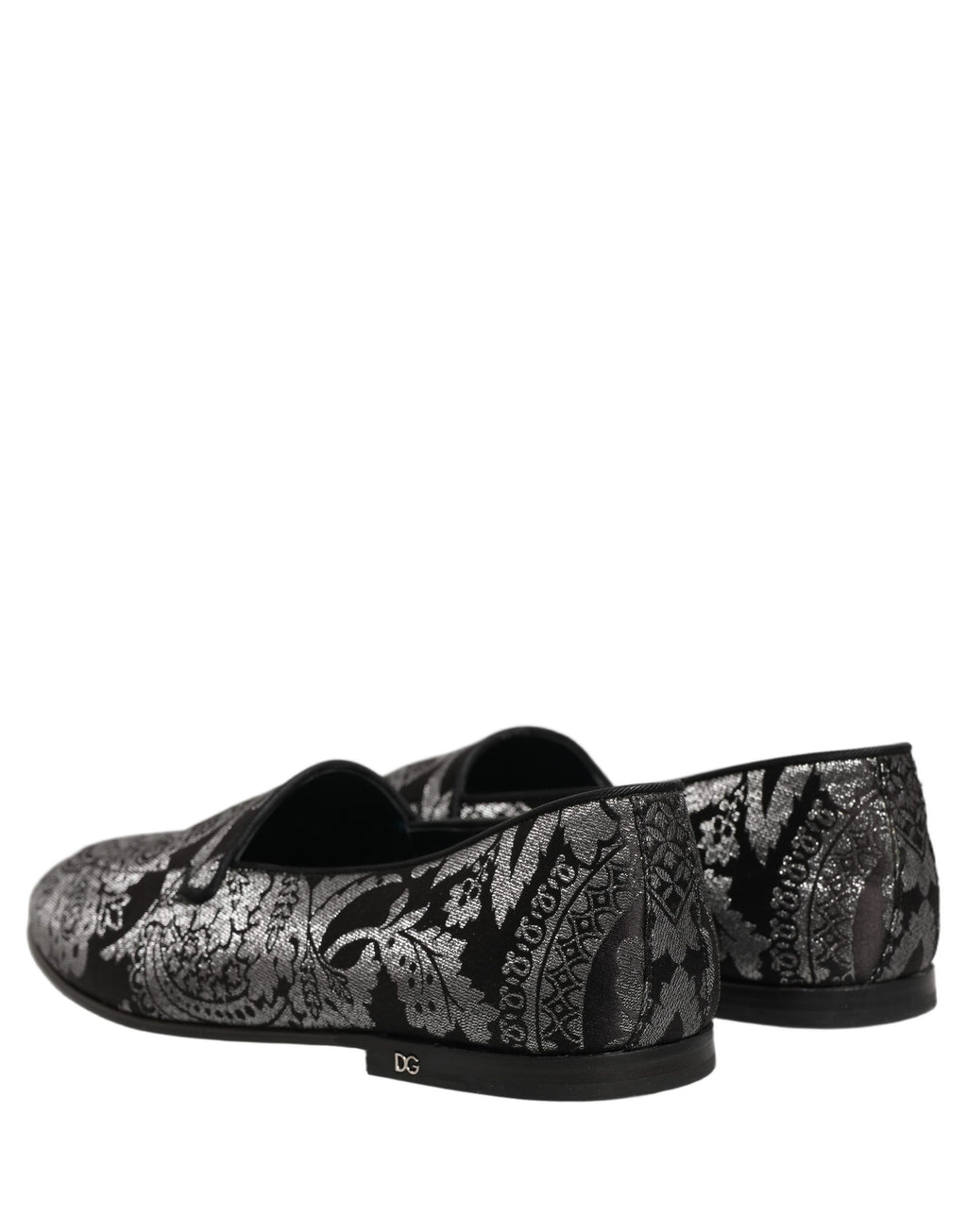 Chaussures mocassins Dolce & Gabbana en jacquard argenté et cuir, style slip-on, avec design élégant et finition soignée.