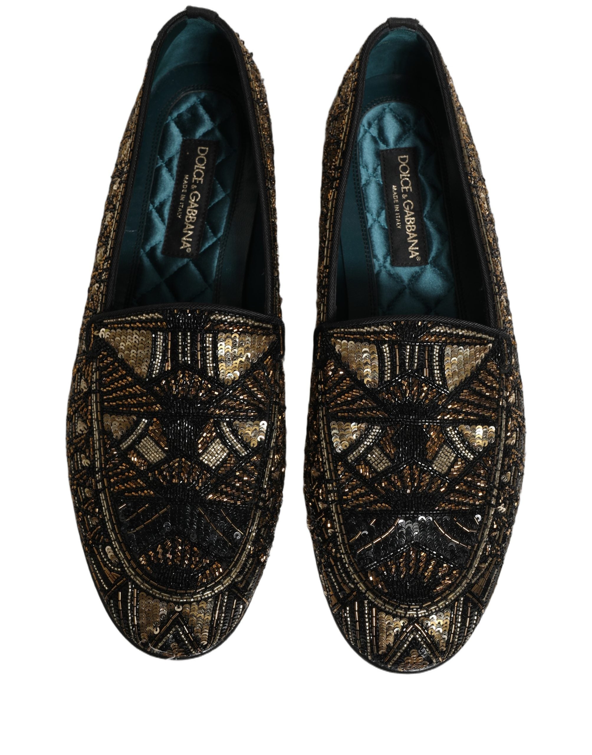 Chaussures mocassins Dolce & Gabbana noires et ornées de détails brillants, style slip-on élégant et sophistiqué.