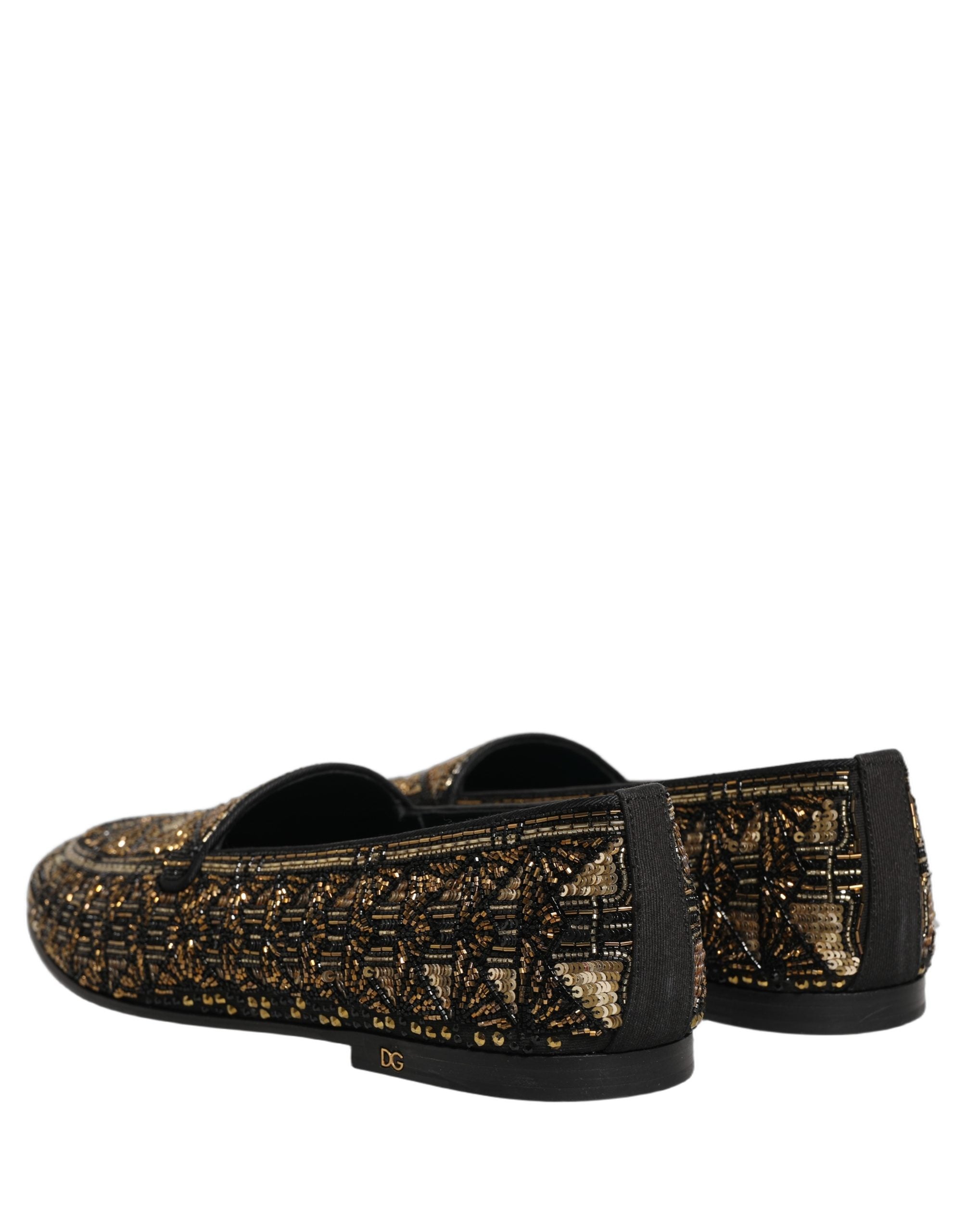 Chaussures mocassins Dolce & Gabbana noires et or ornées de détails brillants, slip-on élégants pour femme.