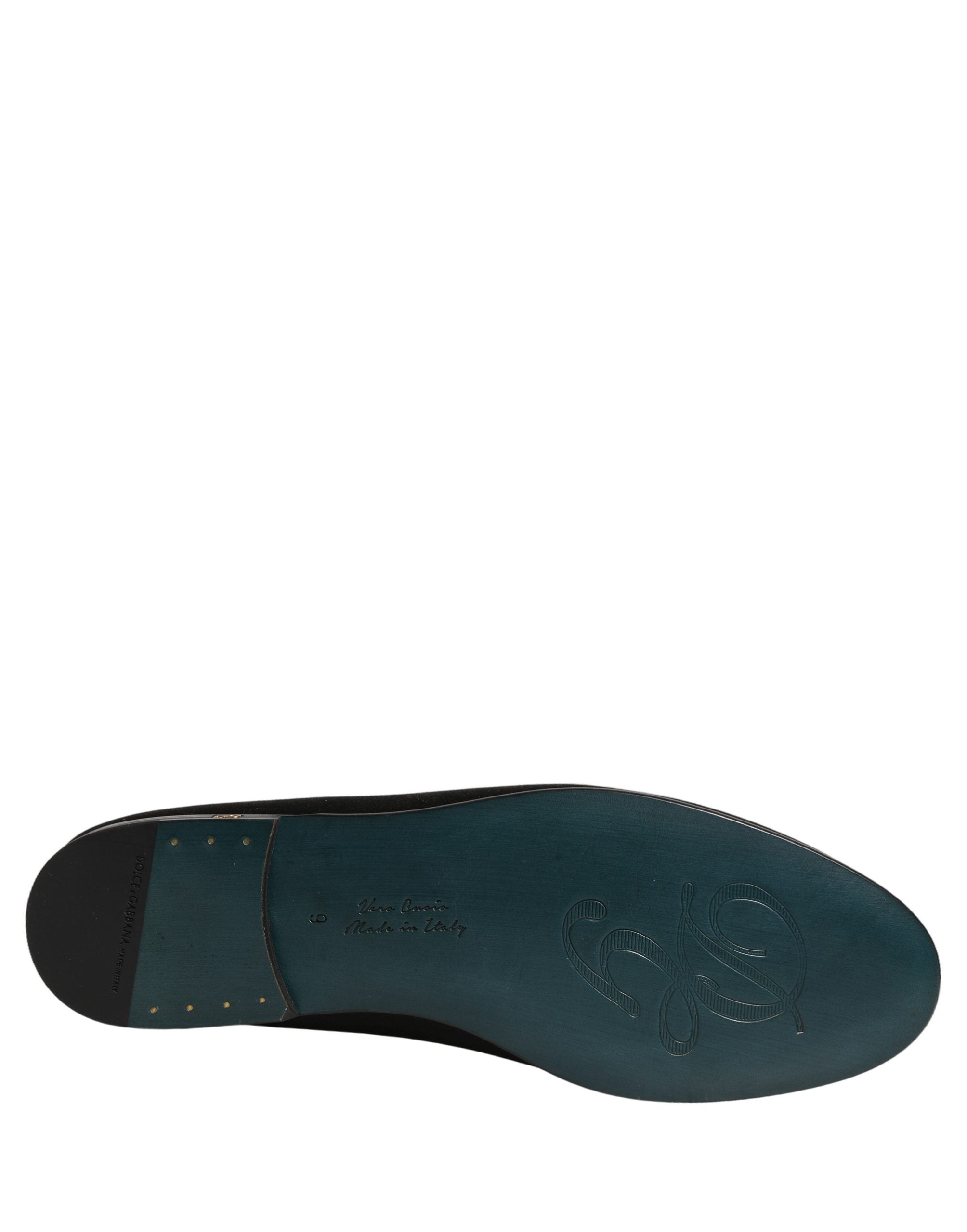 Chaussures mocassins Dolce & Gabbana en satin noir avec logo discret, style slip-on, élégantes et confortables.