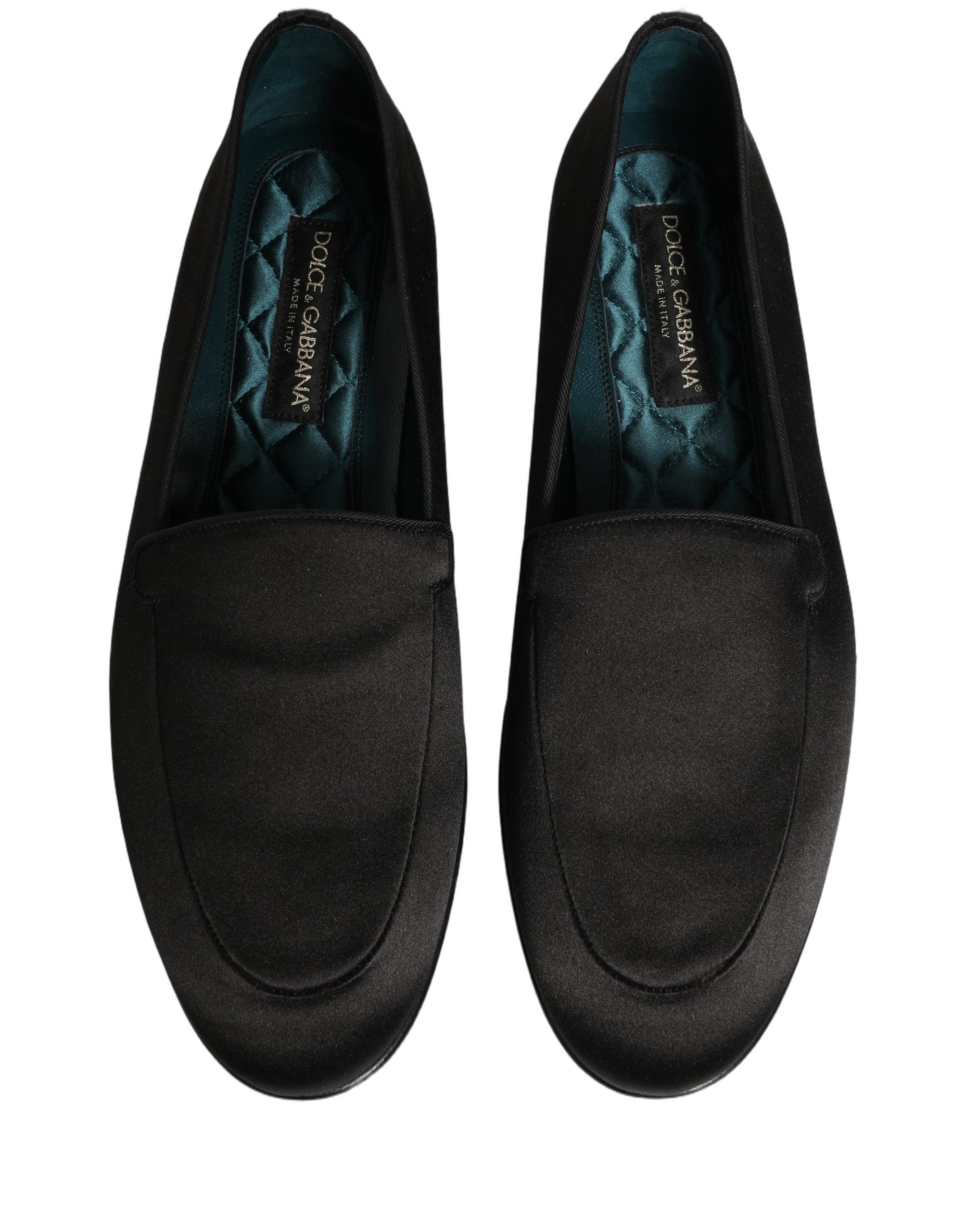Chaussures Dolce & Gabbana flats en satin noir avec logo, slip-on élégants et confortables pour femmes.
