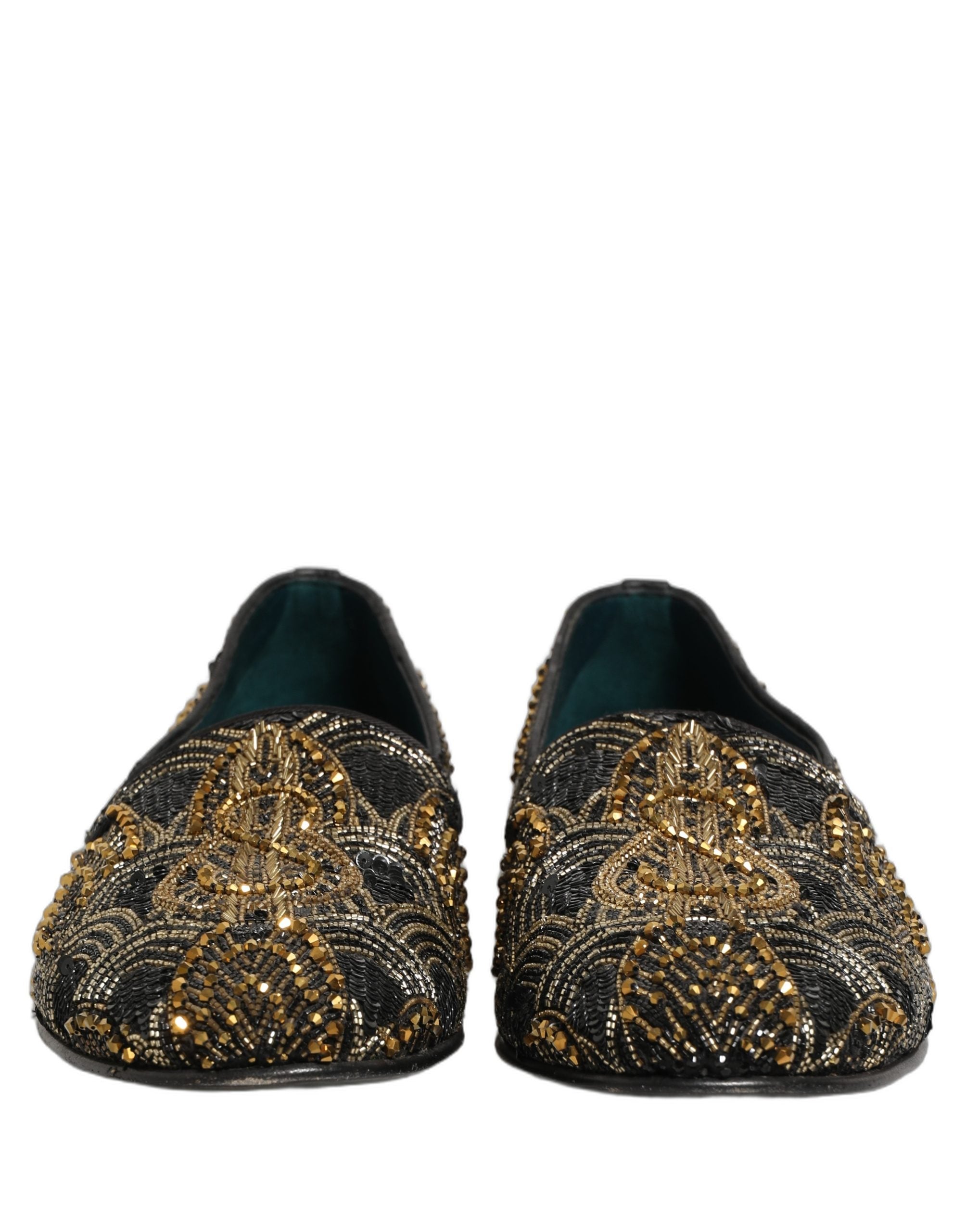 Chaussures mocassins Dolce & Gabbana noir et or avec embellissements élégants, style décontracté chic pour femmes.