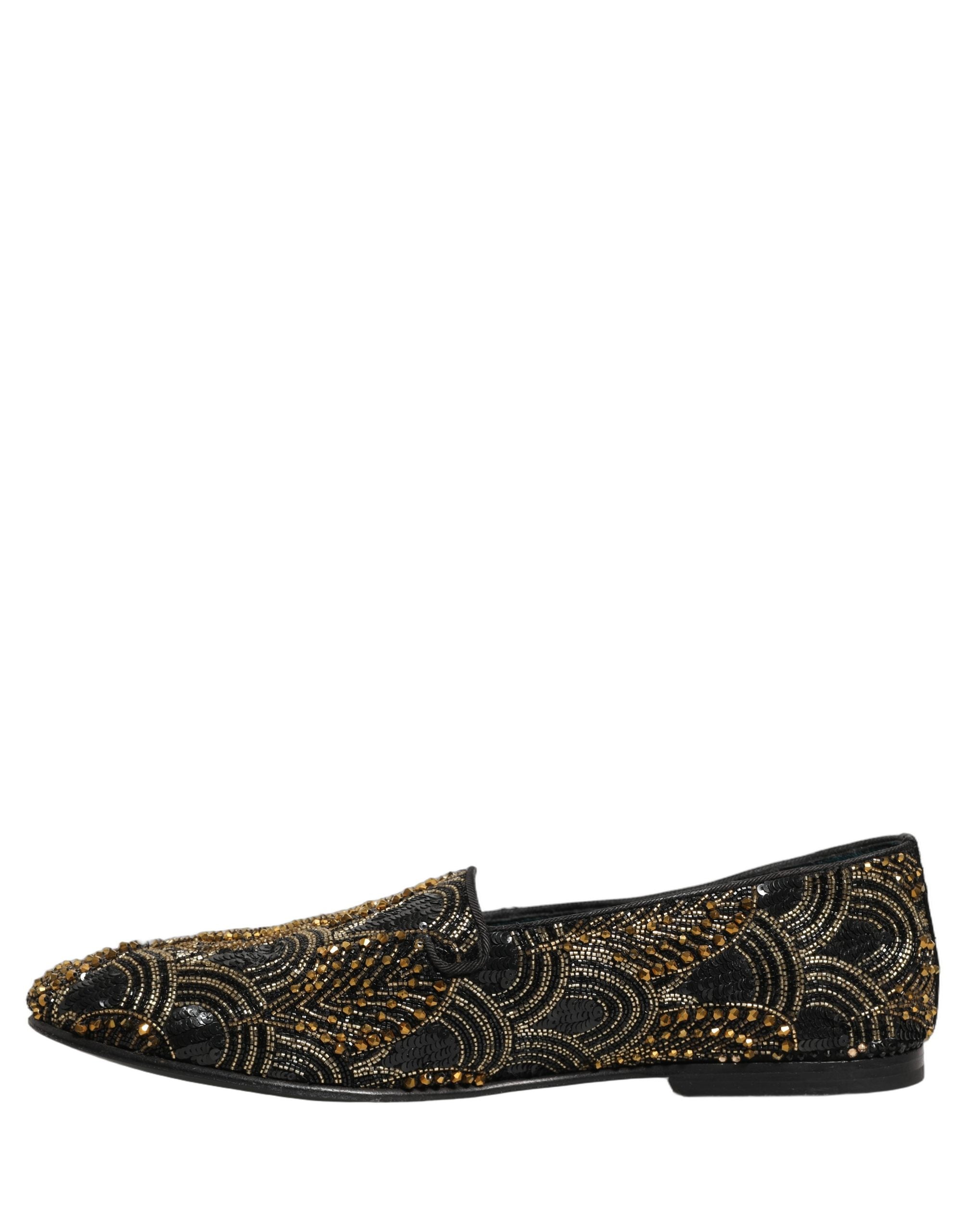 Chaussures loafers Dolce & Gabbana noires et or ornées de détails scintillants, élégantes et sophistiquées.