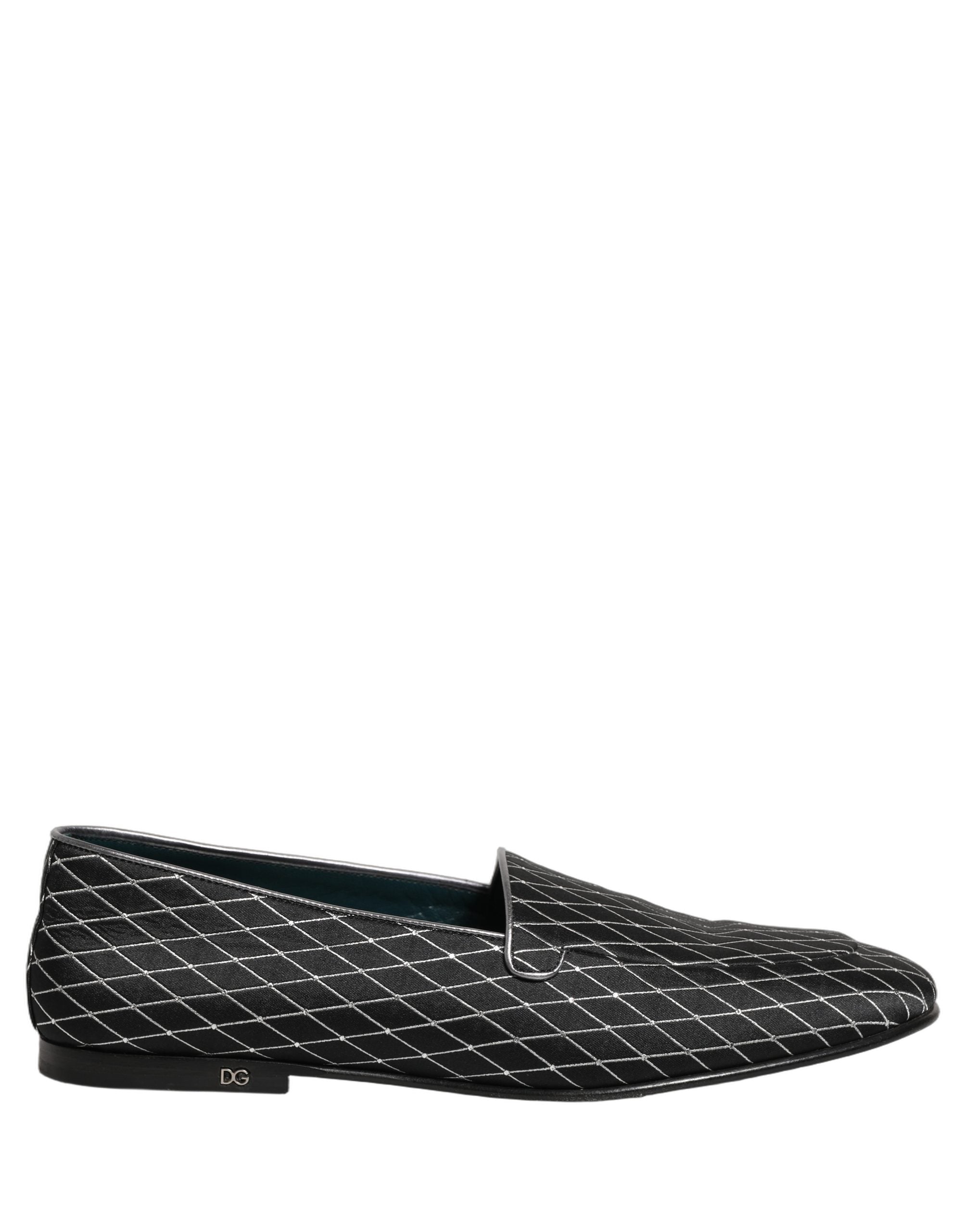 Chaussures loafers en velours noir Dolce & Gabbana avec couture en diamant, élégantes et sophistiquées, vues de côté.