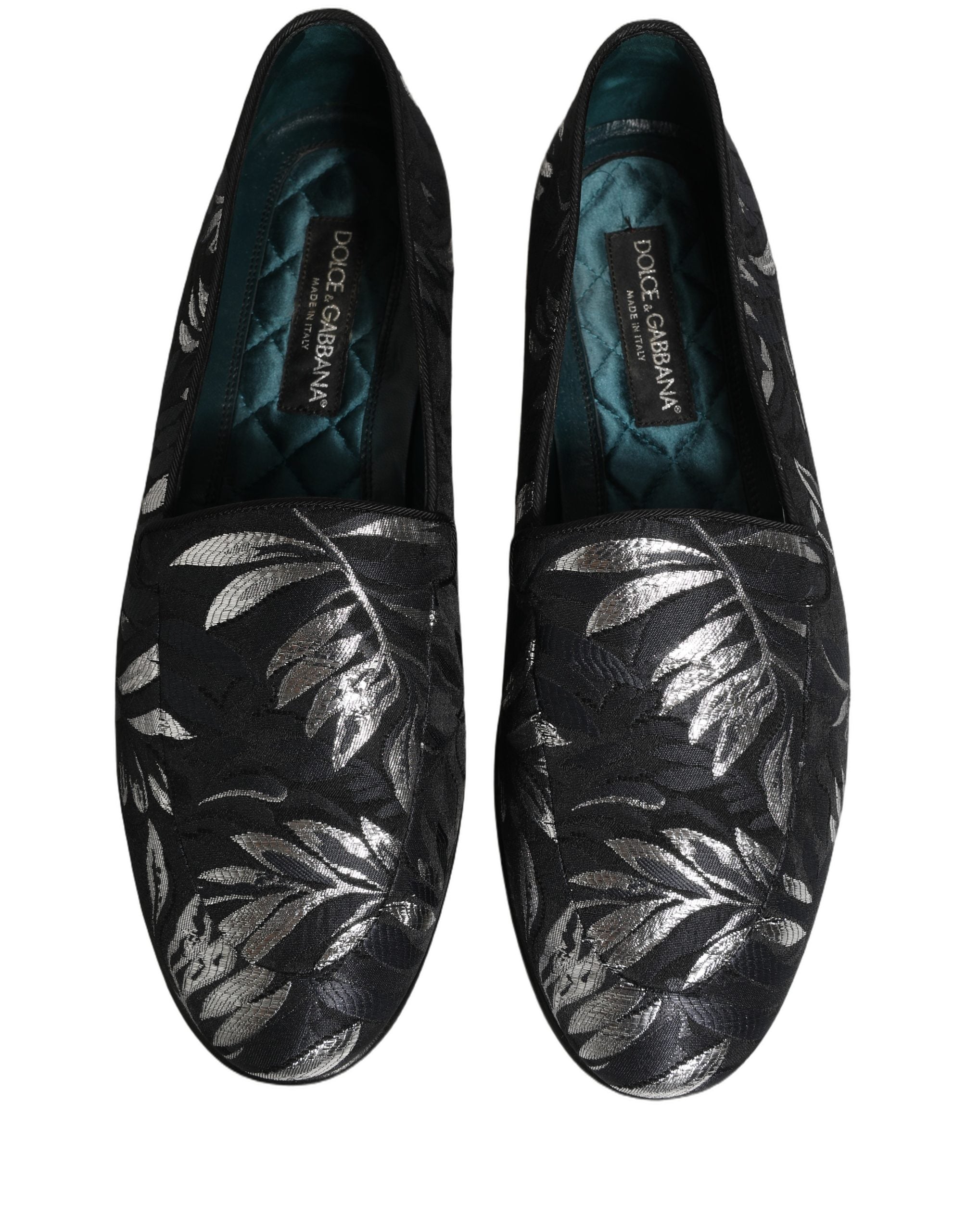 Chaussures loafers Dolce & Gabbana en cuir noir avec broderie de feuilles, style élégant pour hommes.