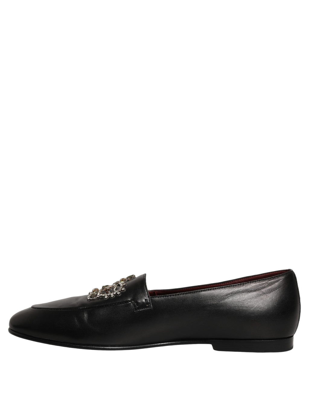 Mocassins en cuir noir Dolce & Gabbana avec couronne ornée de bijoux, élégants et sophistiqués pour homme.