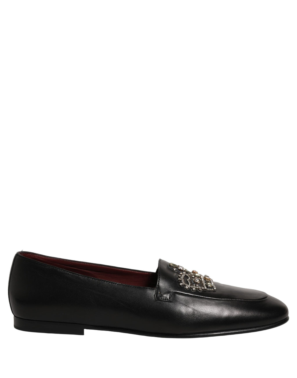 Chaussures loafers en cuir noir Dolce & Gabbana avec couronne ornée et embellissements élégants.