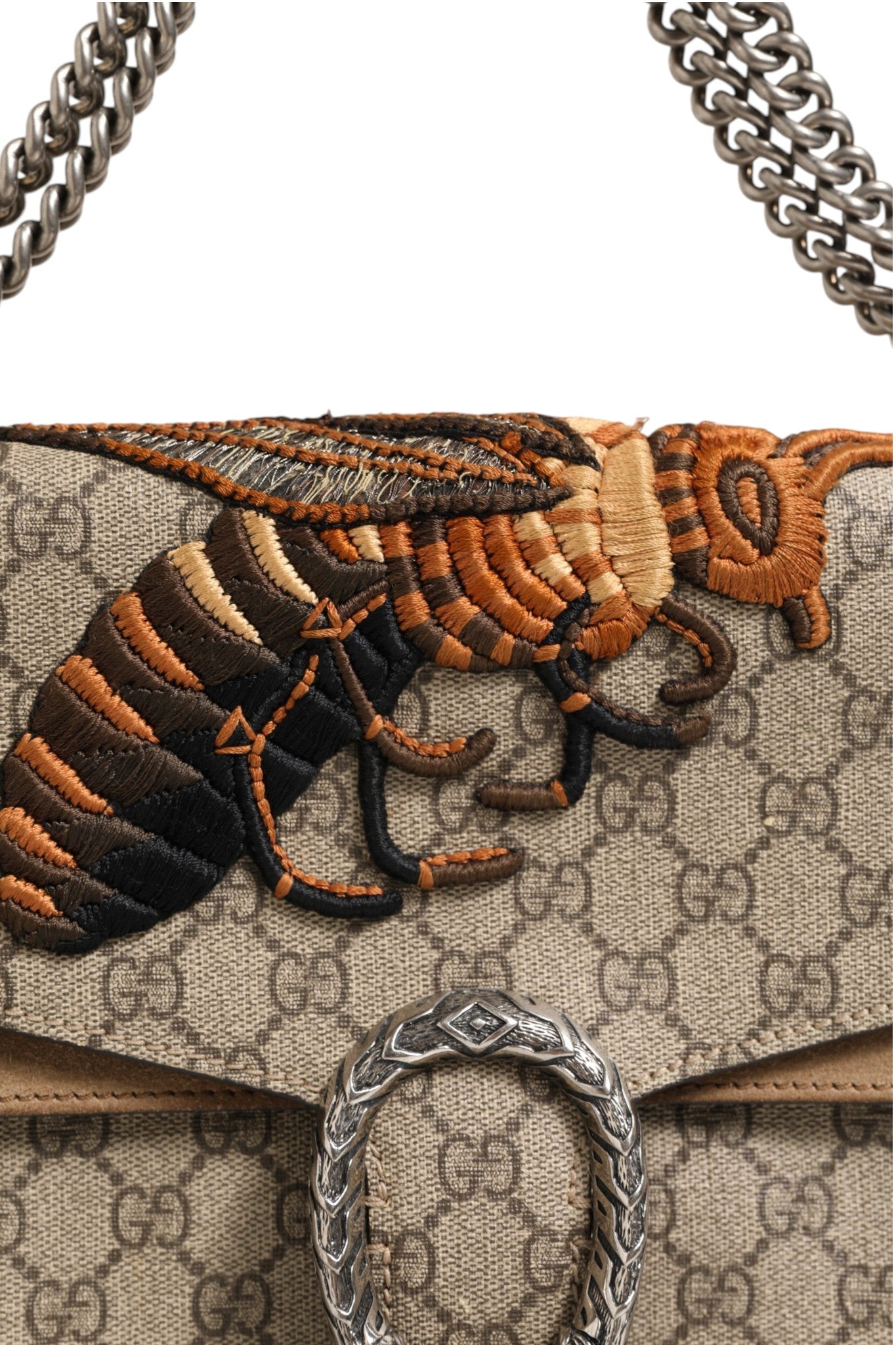 Sac à bandoulière Gucci avec monogramme Supreme, broderie abeille, design élégant et distinctif.