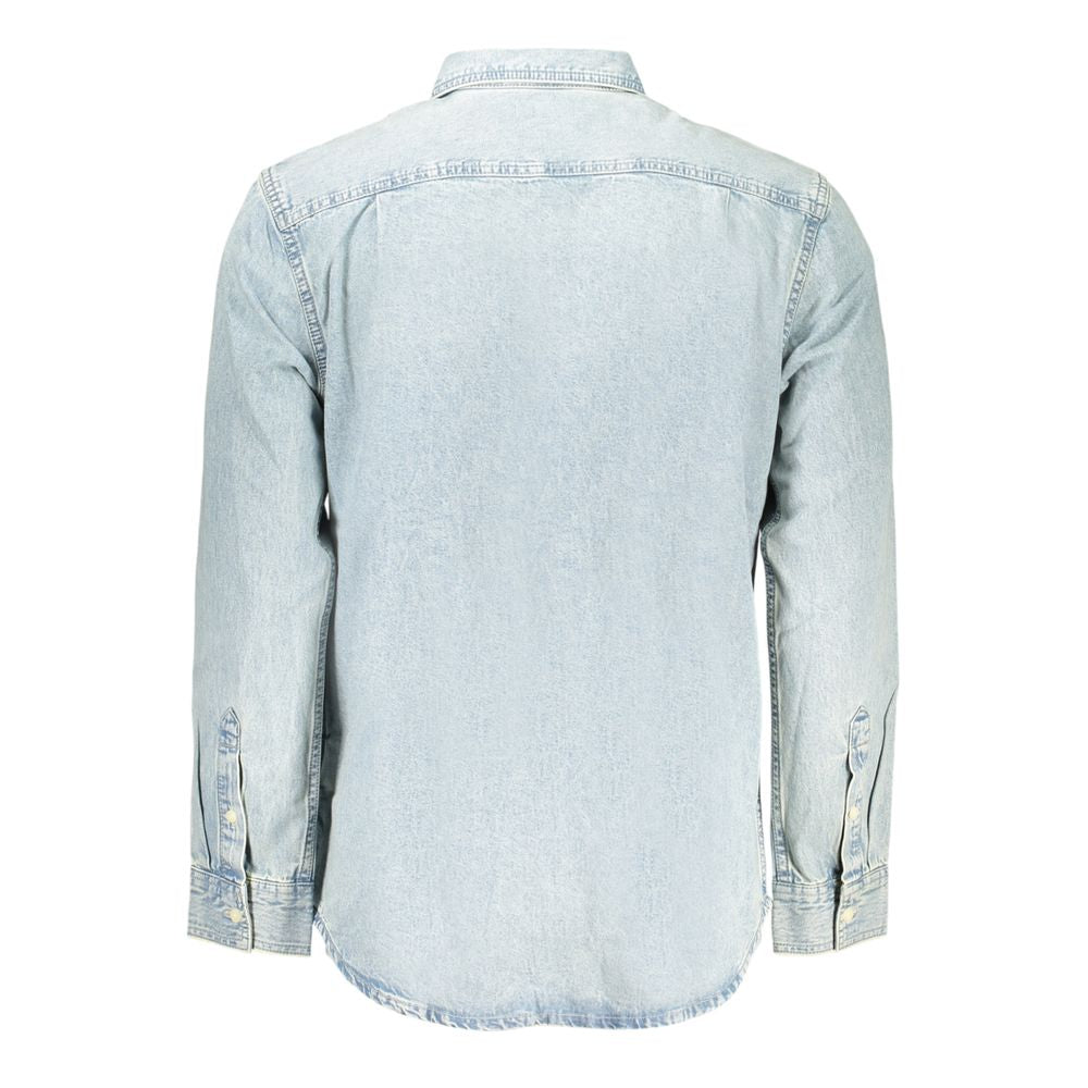 Chemise pour homme en coton Calvin Klein Azzurro, couleur bleue claire, avec col et boutons visibles.